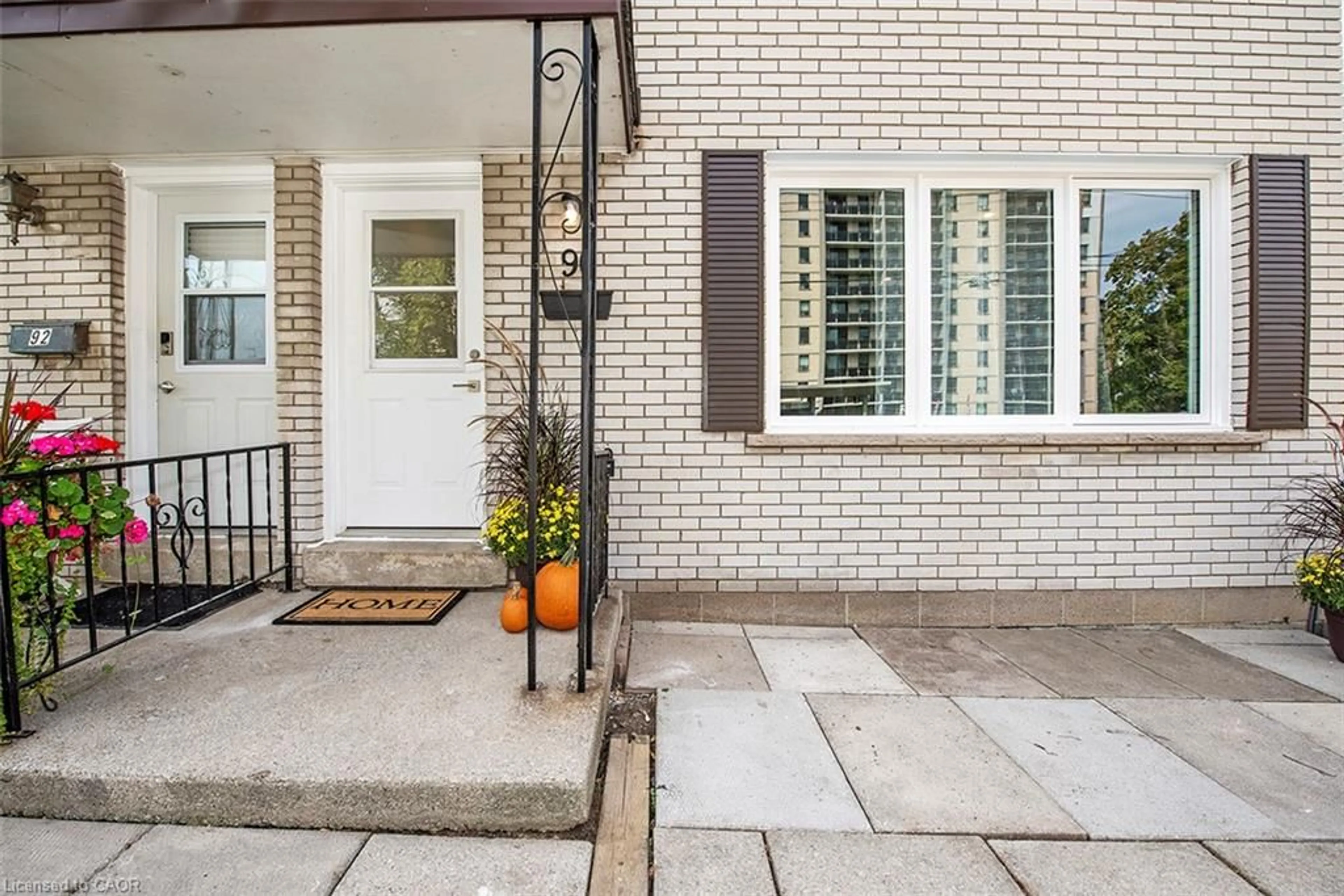 Home with brick exterior material, street for 88 & 90 Delawana Dr, Hamilton Ontario L8E 1G4
