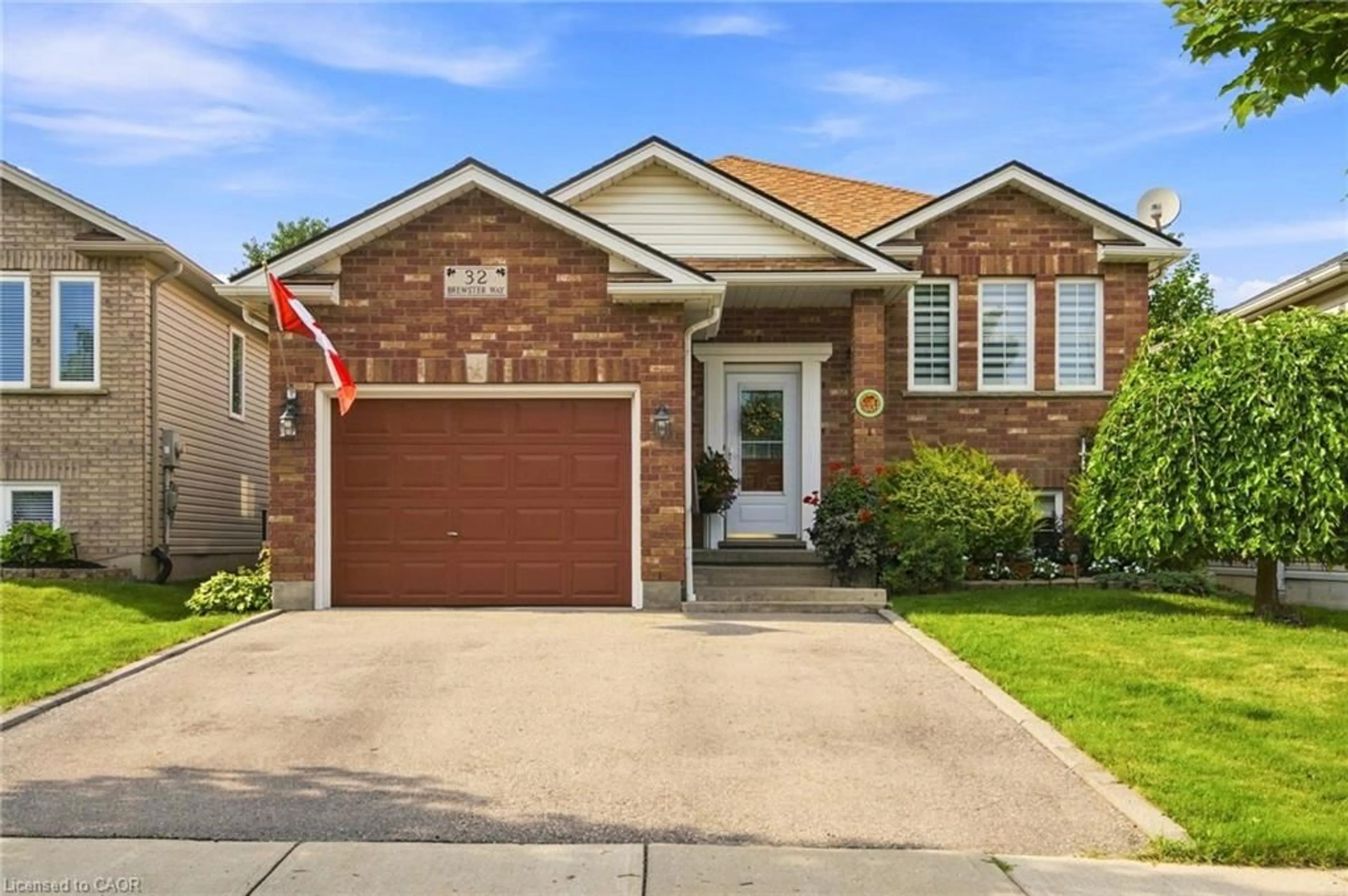 Home with brick exterior material, street for 32 Brewster Way, Brantford Ontario N3T 6N4