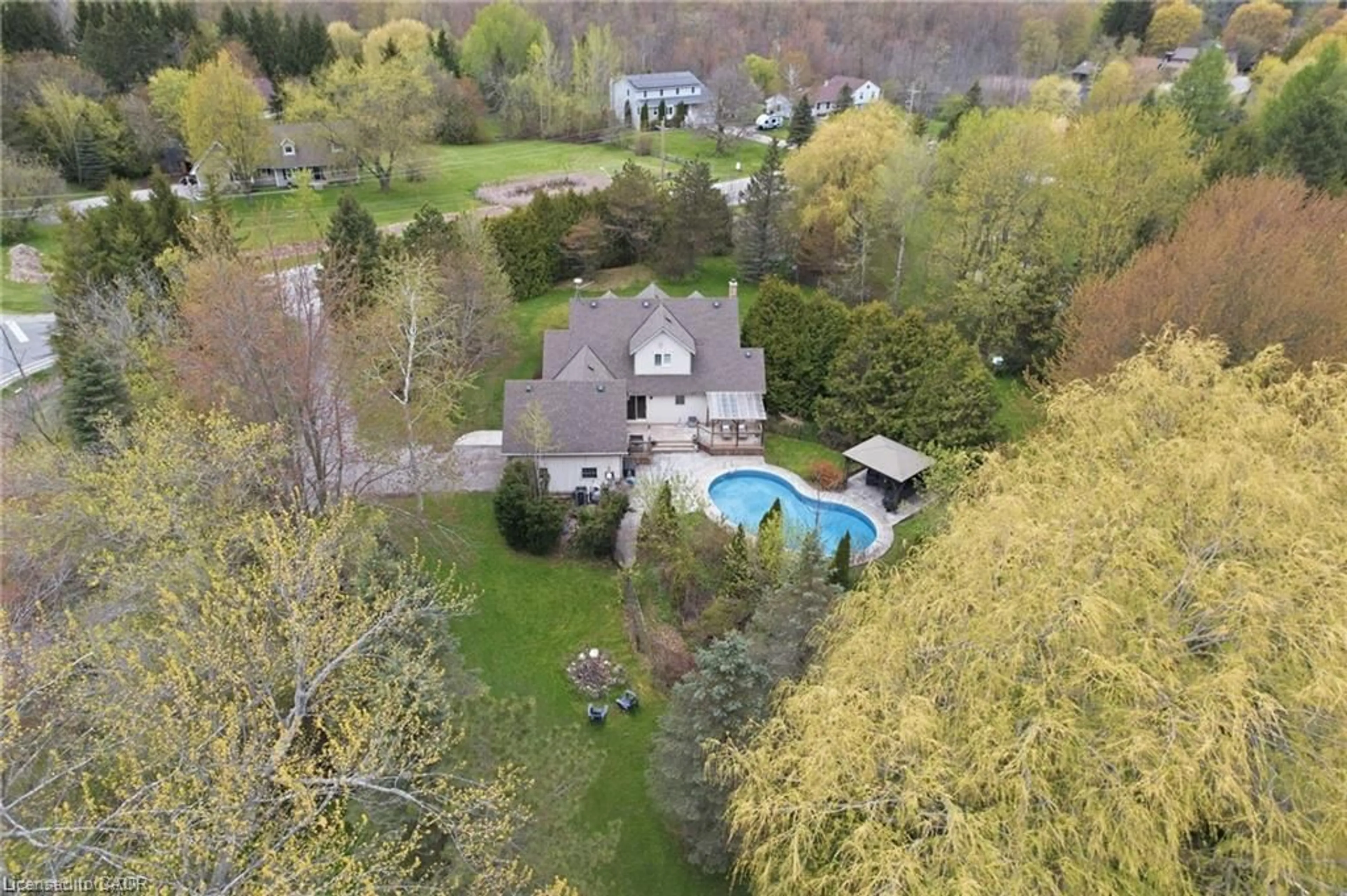 A pic from outside/outdoor area/front of a property/back of a property/a pic from drone, water/lake/river/ocean view for 2000 15 Side Rd, Milton Ontario L0P 1B0