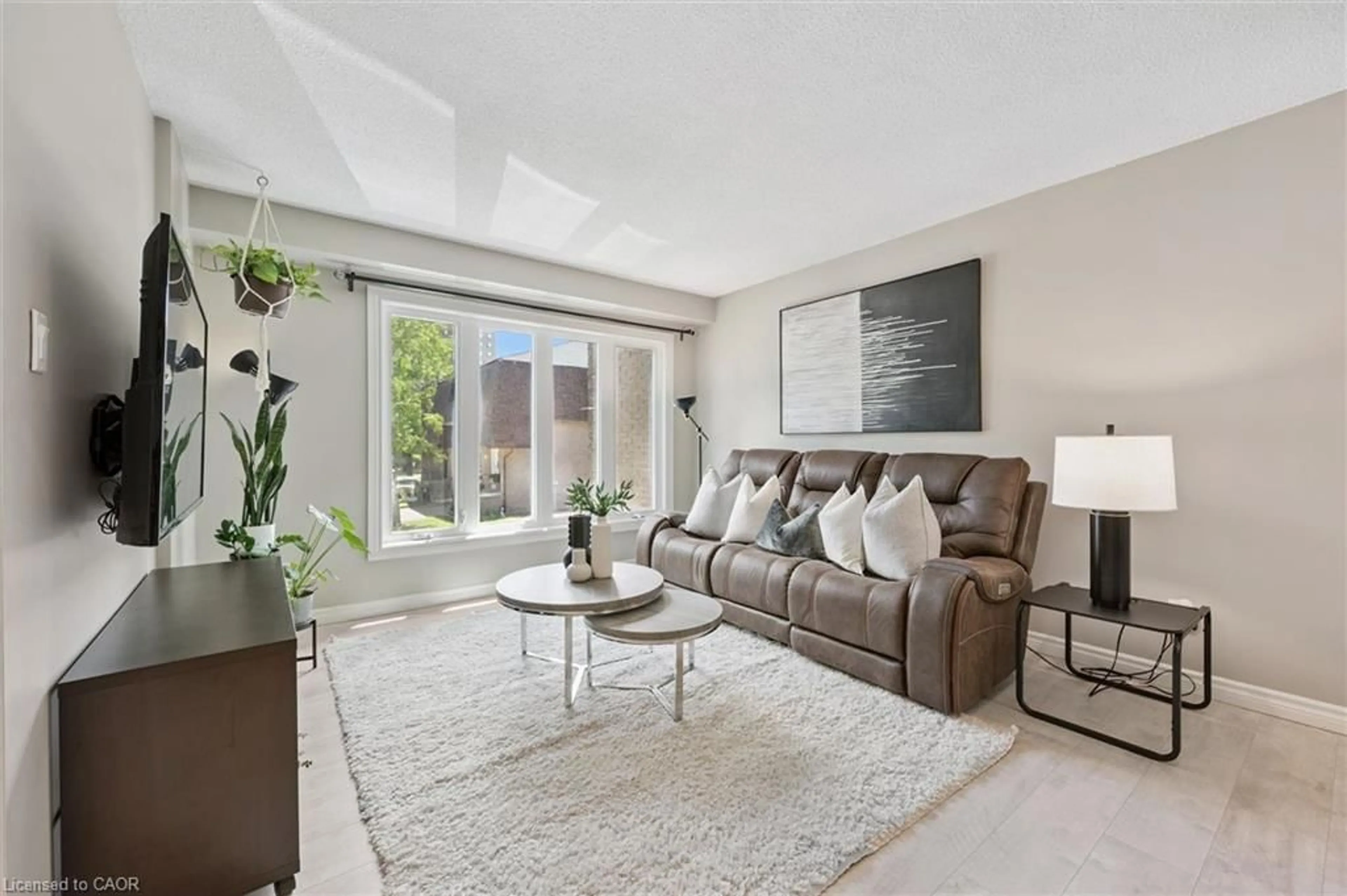 Living room with furniture, unknown for 49 Cedarwoods Cres #53, Kitchener Ontario N2C 2L1