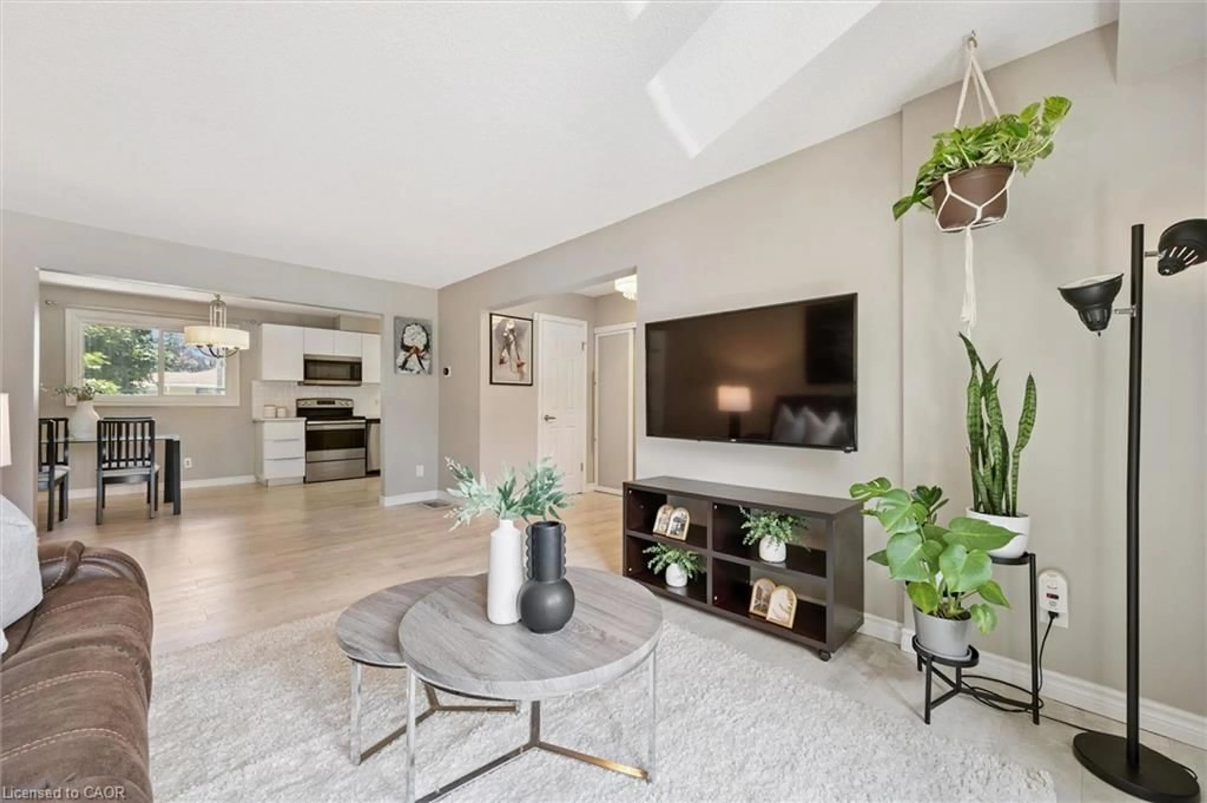 Living room with furniture, unknown for 49 Cedarwoods Cres #53, Kitchener Ontario N2C 2L1