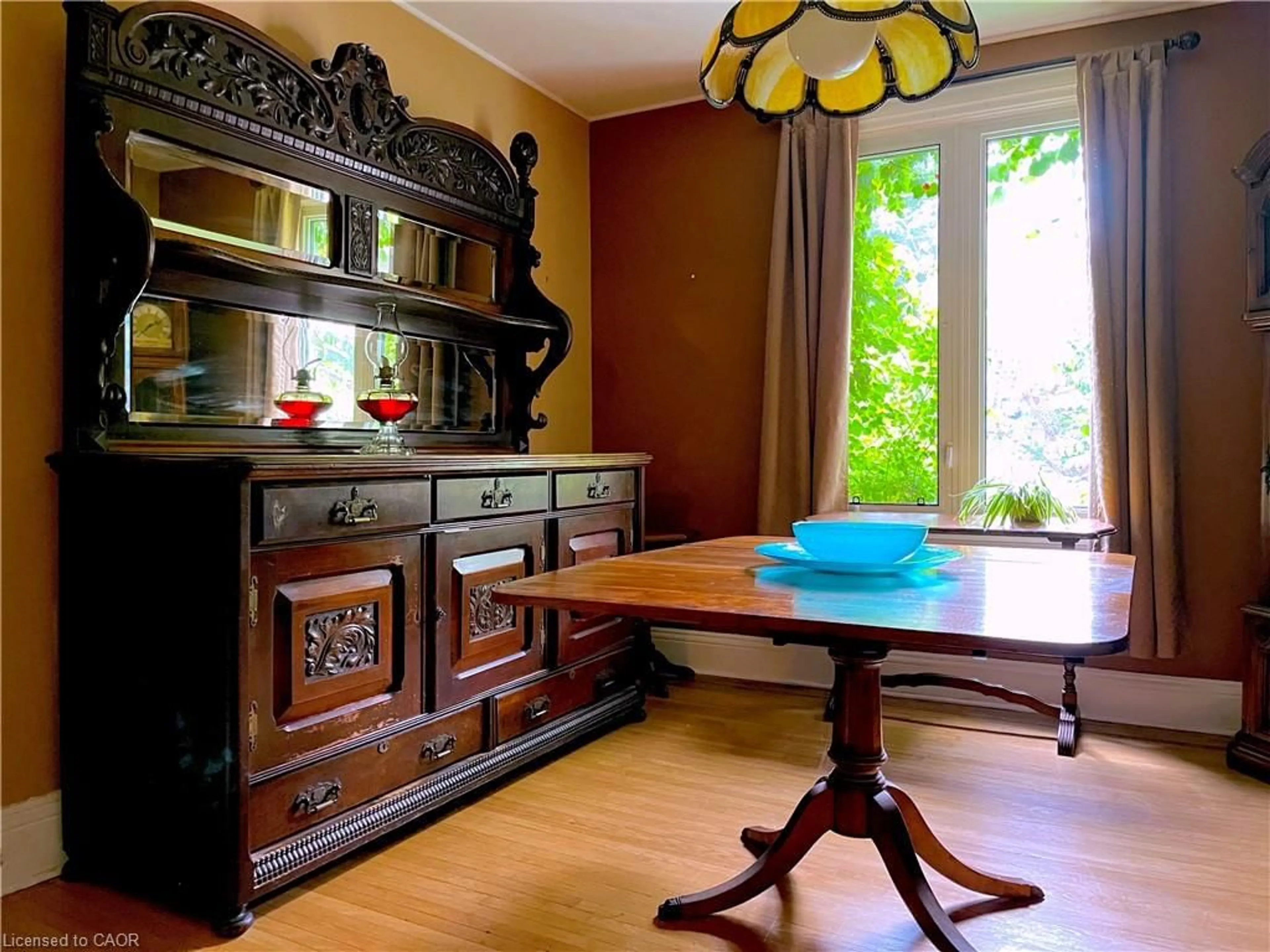 Dining room, wood/laminate floor for 137 Maplewood Ave, Hamilton Ontario L8M 1X3
