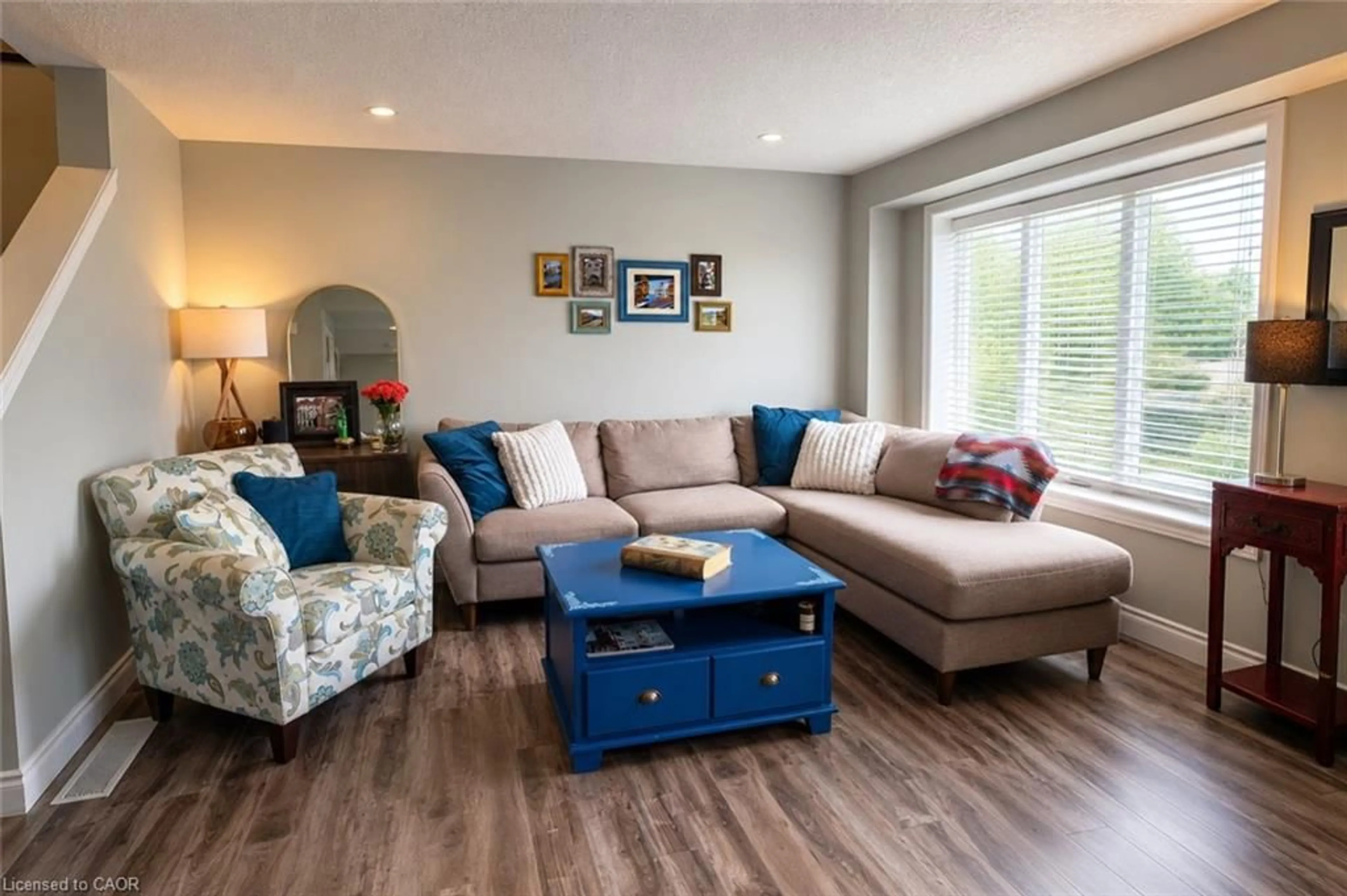 Living room with furniture, wood/laminate floor for 38 Tudor St, Kitchener Ontario N2R 1W4