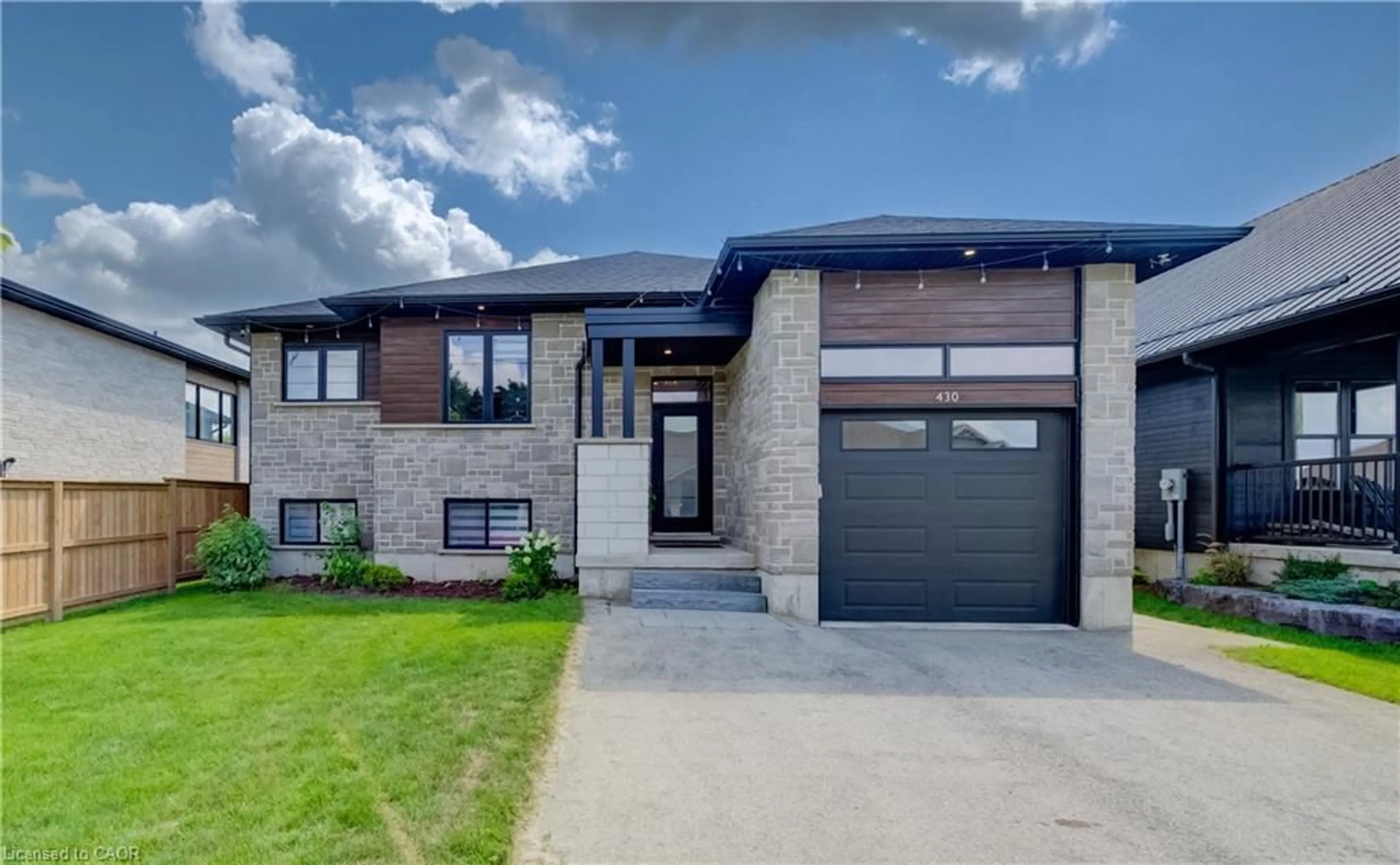 Home with brick exterior material, street for 430 Wellington St, Mount Forest Ontario N0G 2L4