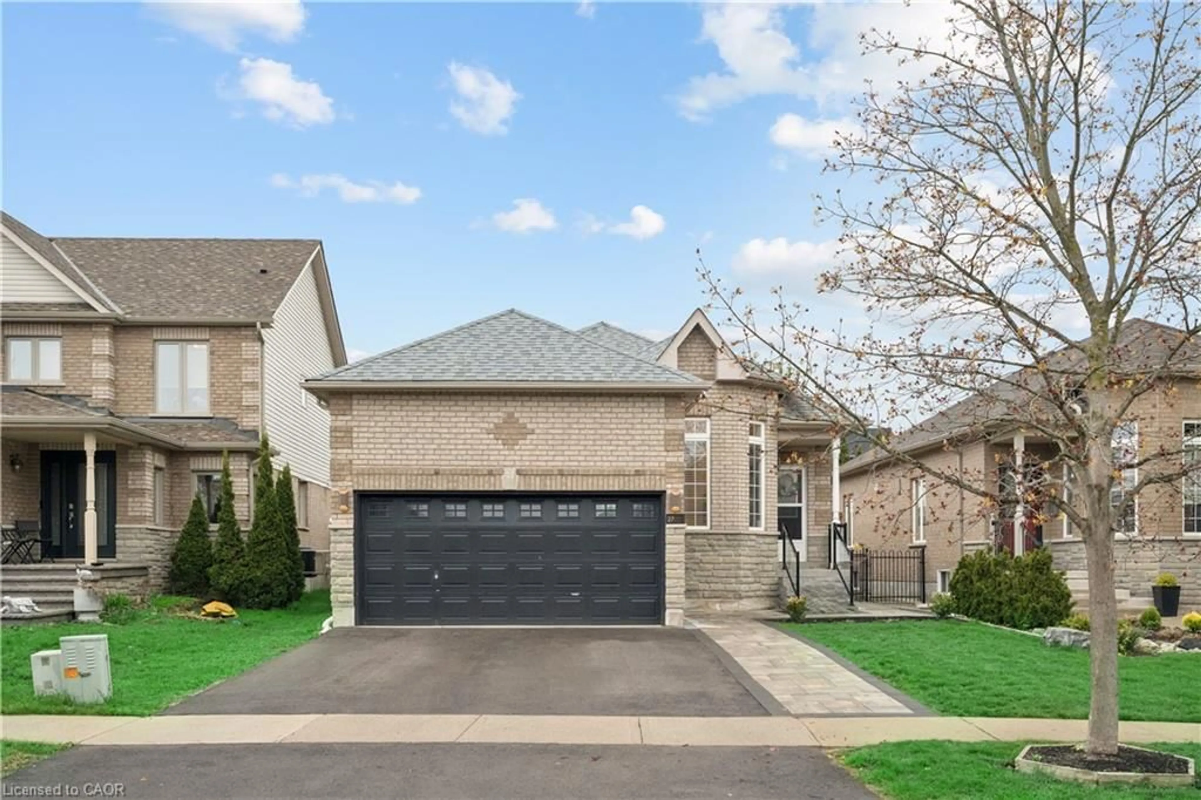 Home with brick exterior material, street for 27 Spruce Blvd, Acton Ontario L7J 2Y3