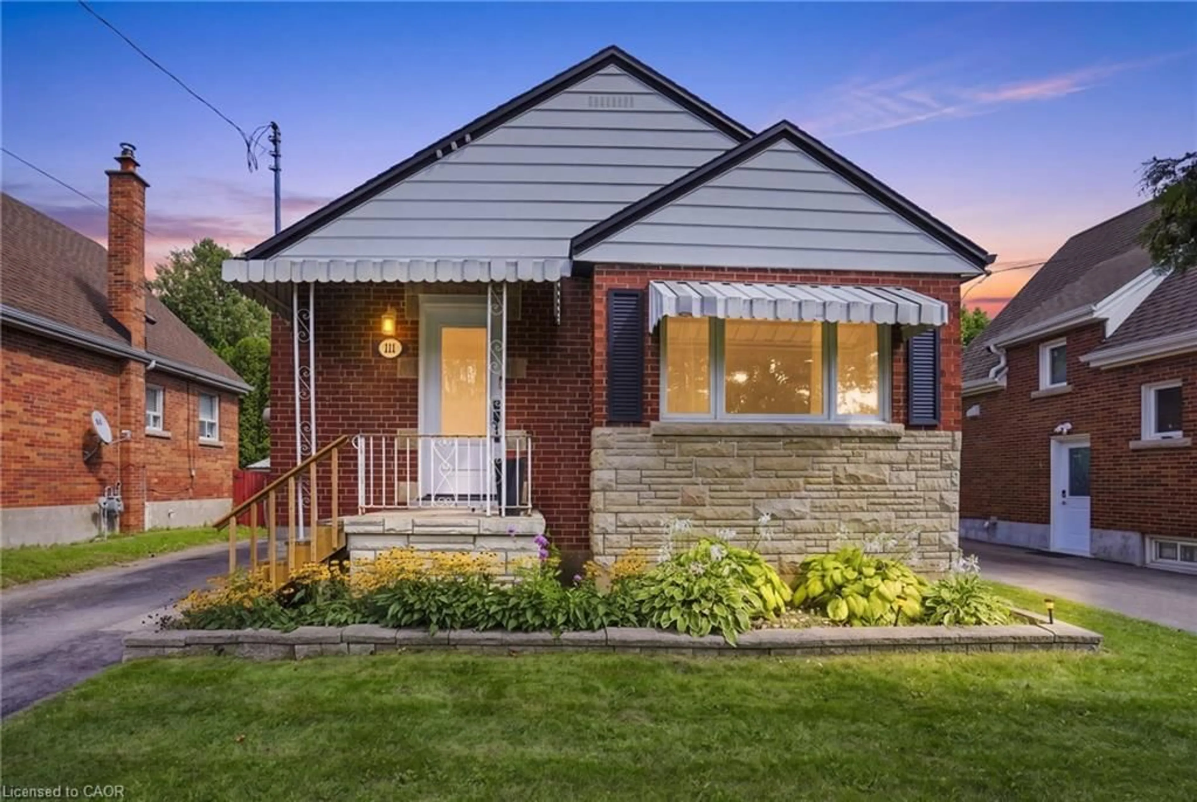 Home with brick exterior material, street for 111 Sharon Ave, Hamilton Ontario L8T 1E4