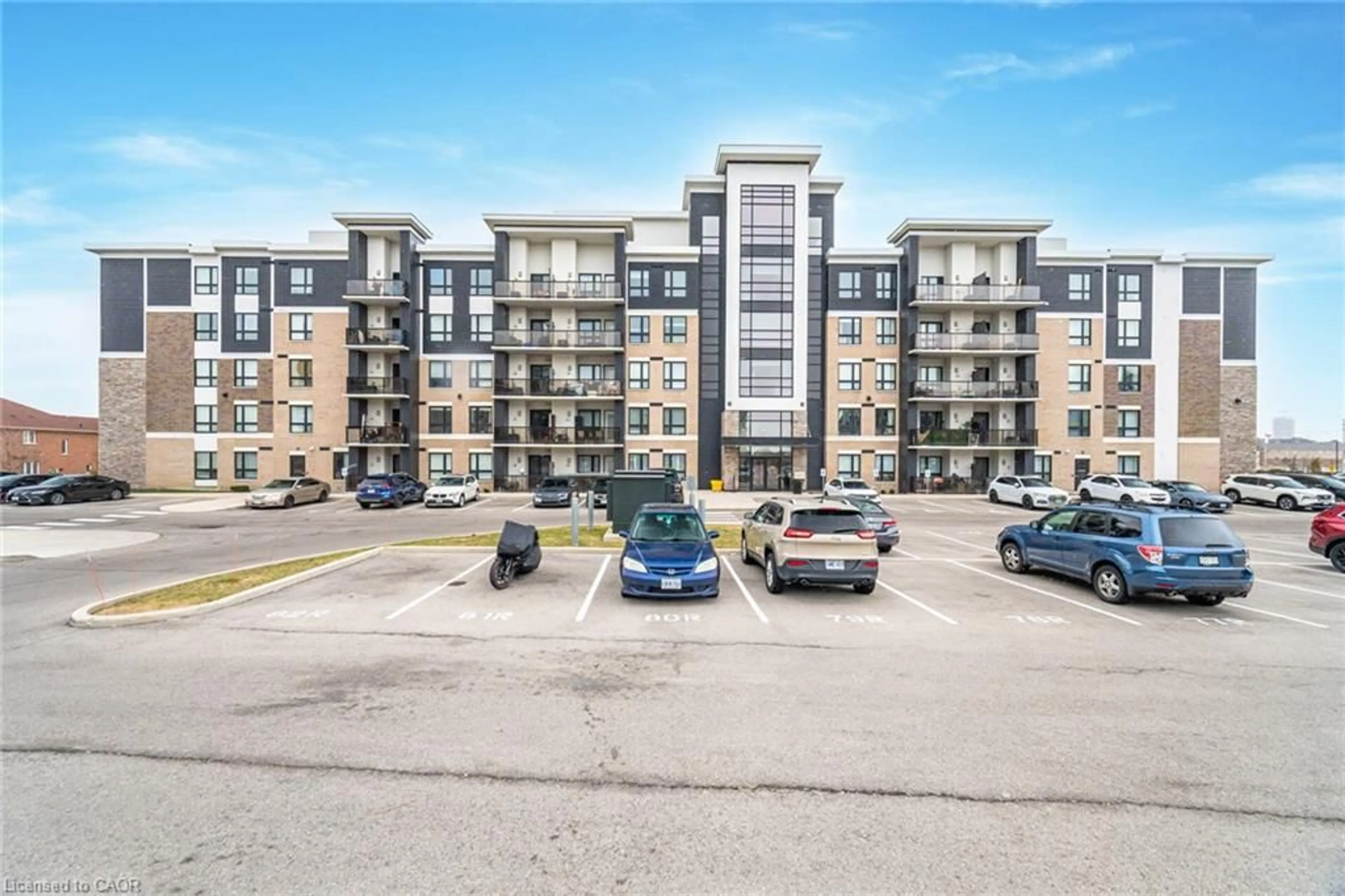 A pic from outside/outdoor area/front of a property/back of a property/a pic from drone, building for 650 Sauve St #107, Milton Ontario L9T 9A8