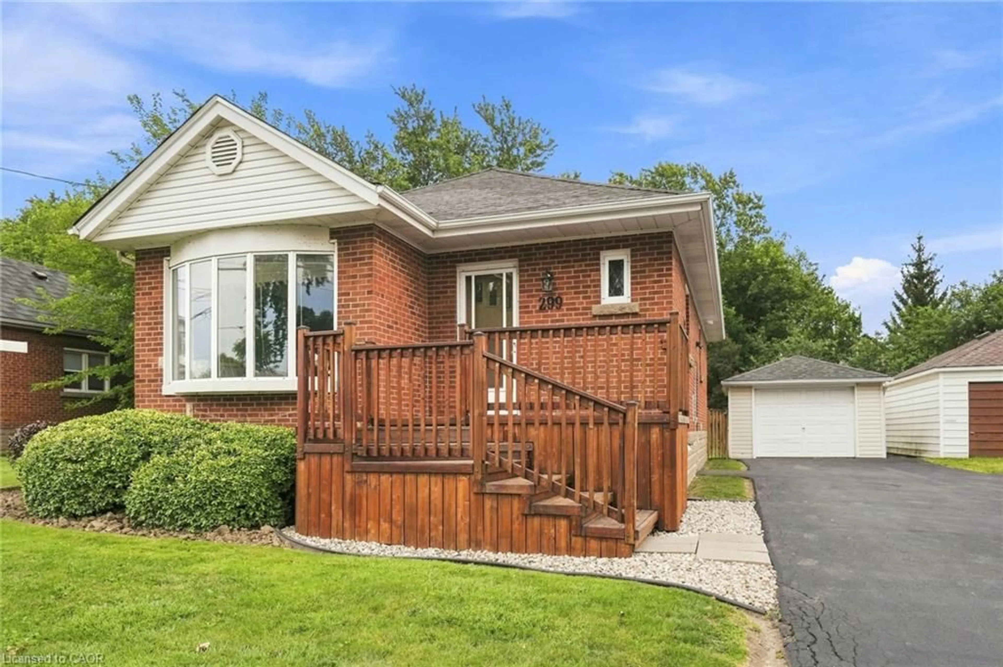 Home with brick exterior material, street for 299 West 5th St, Hamilton Ontario L9C 3P2