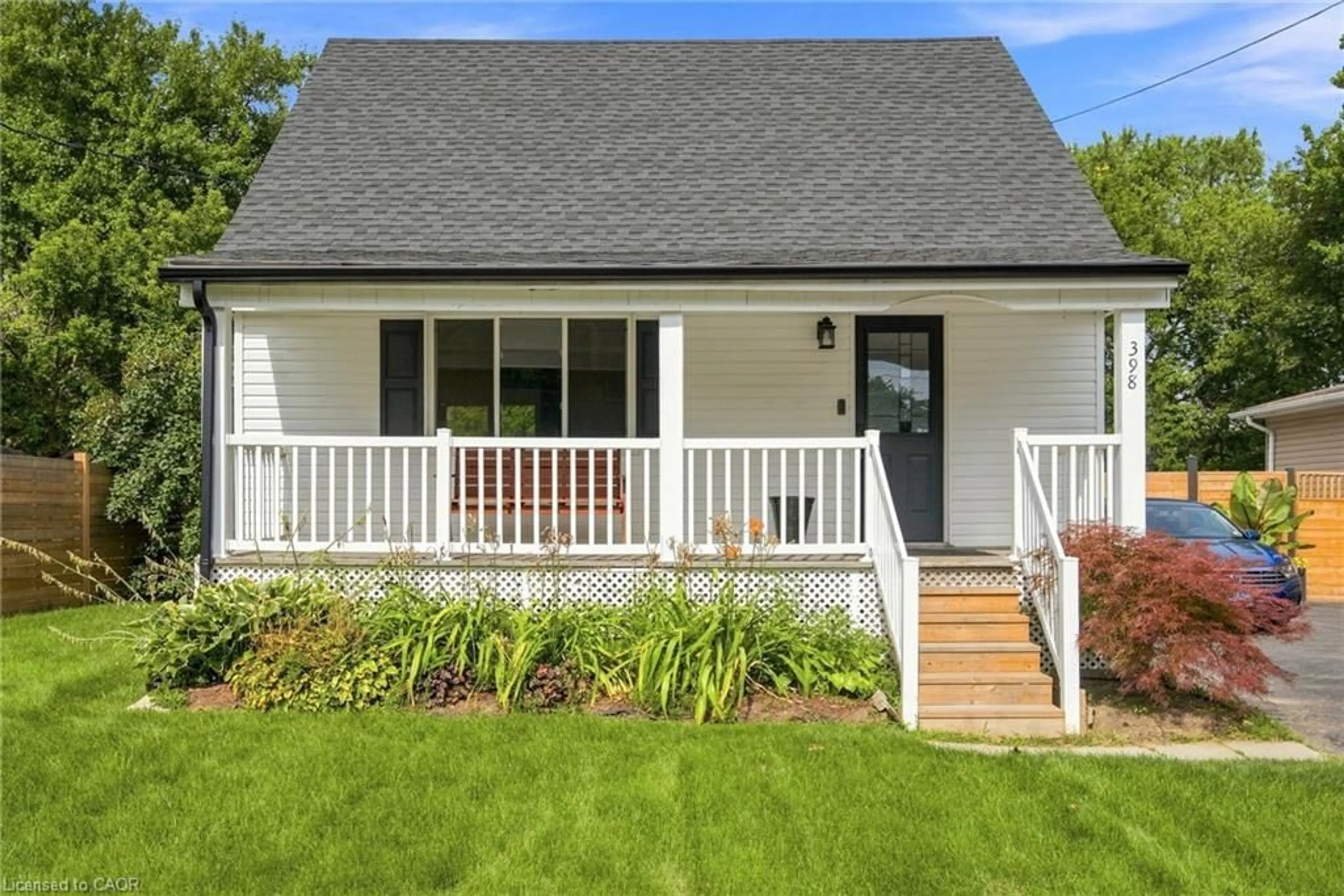Home with vinyl exterior material, street for 398 East 38th St, Hamilton Ontario L8V 4G6