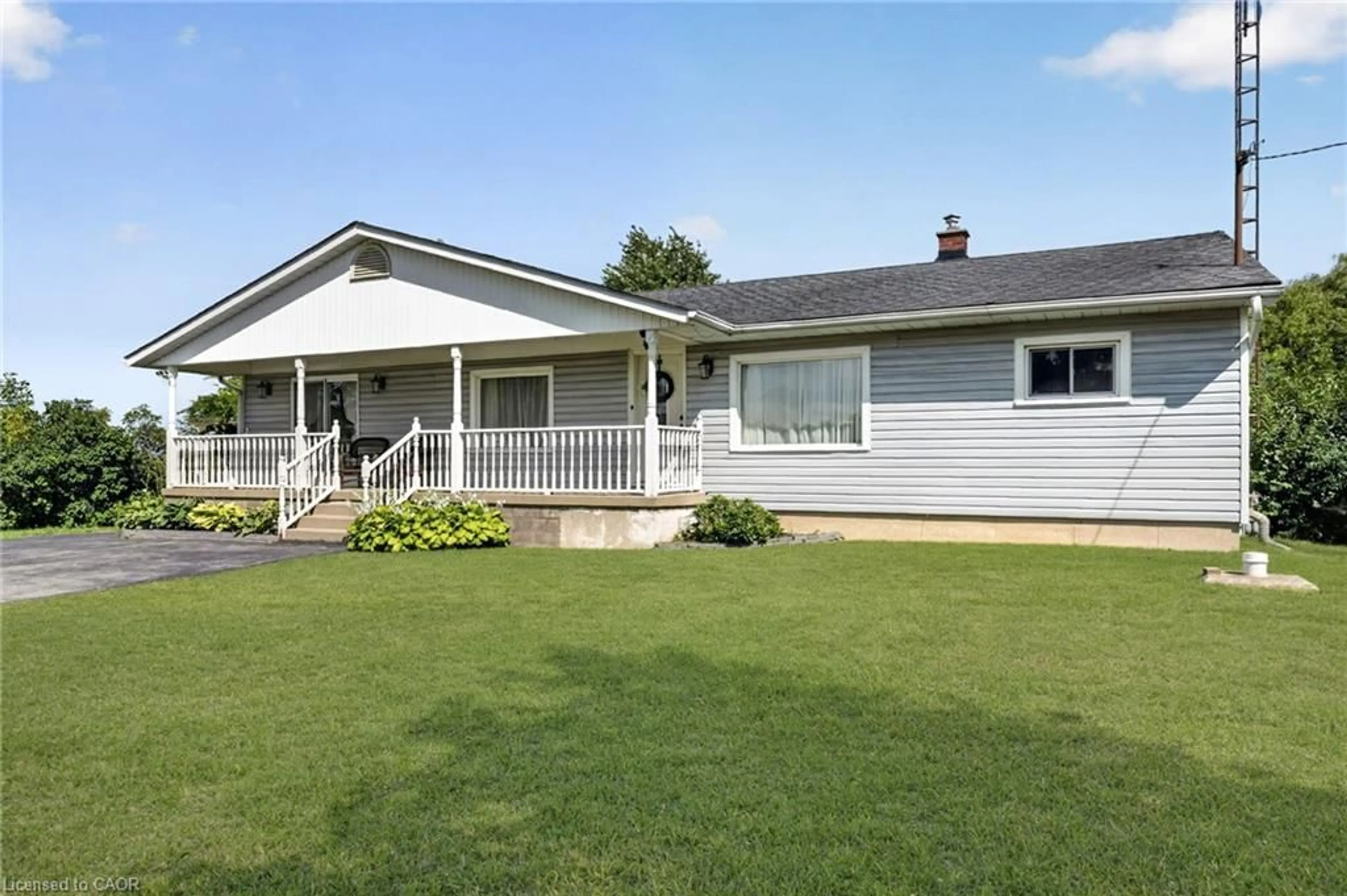Home with vinyl exterior material, street for 3235 Grassie Rd, West Lincoln Ontario L0R 1M0