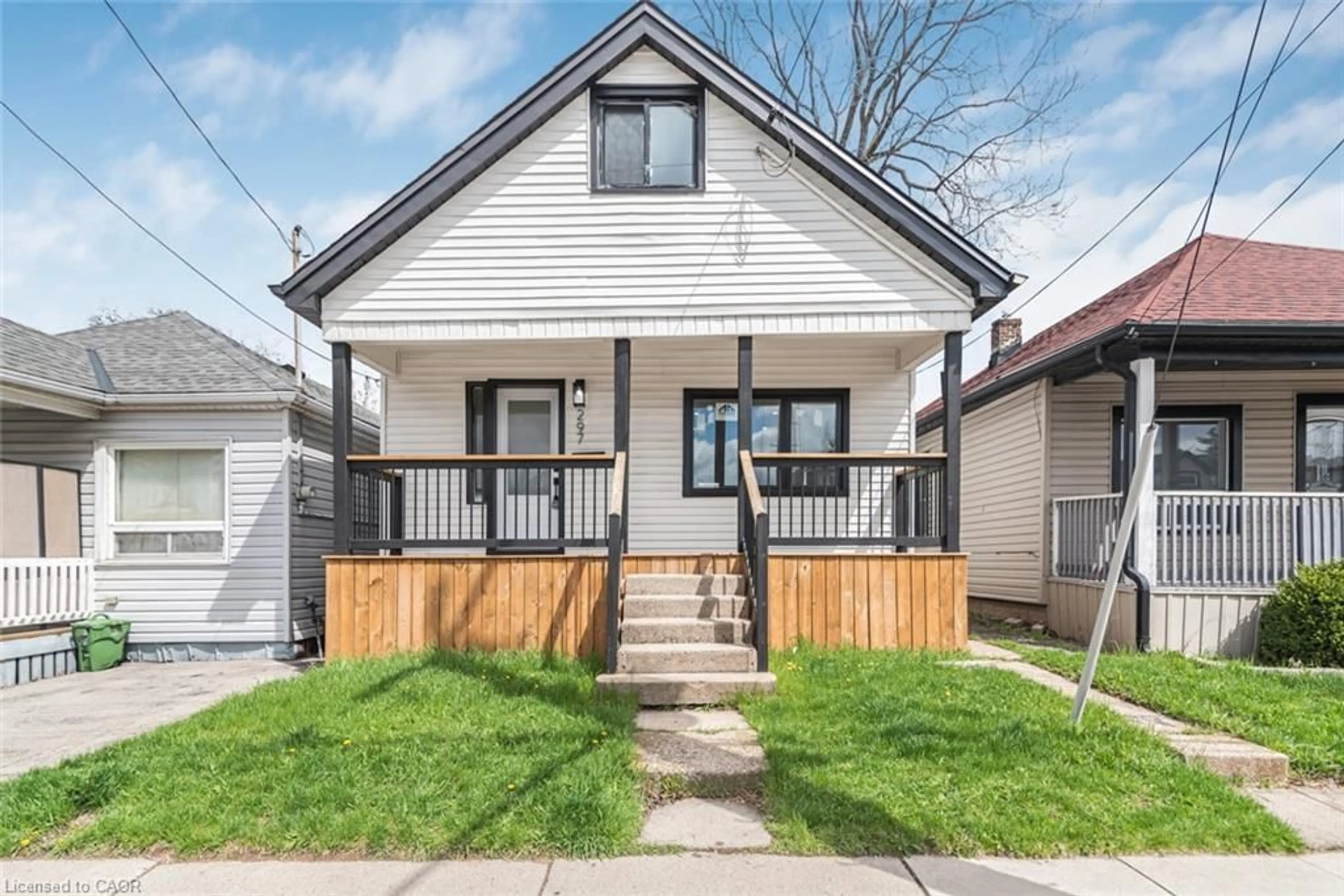 Home with vinyl exterior material, street for 297 Britannia Ave, Hamilton Ontario L8H 1Y2