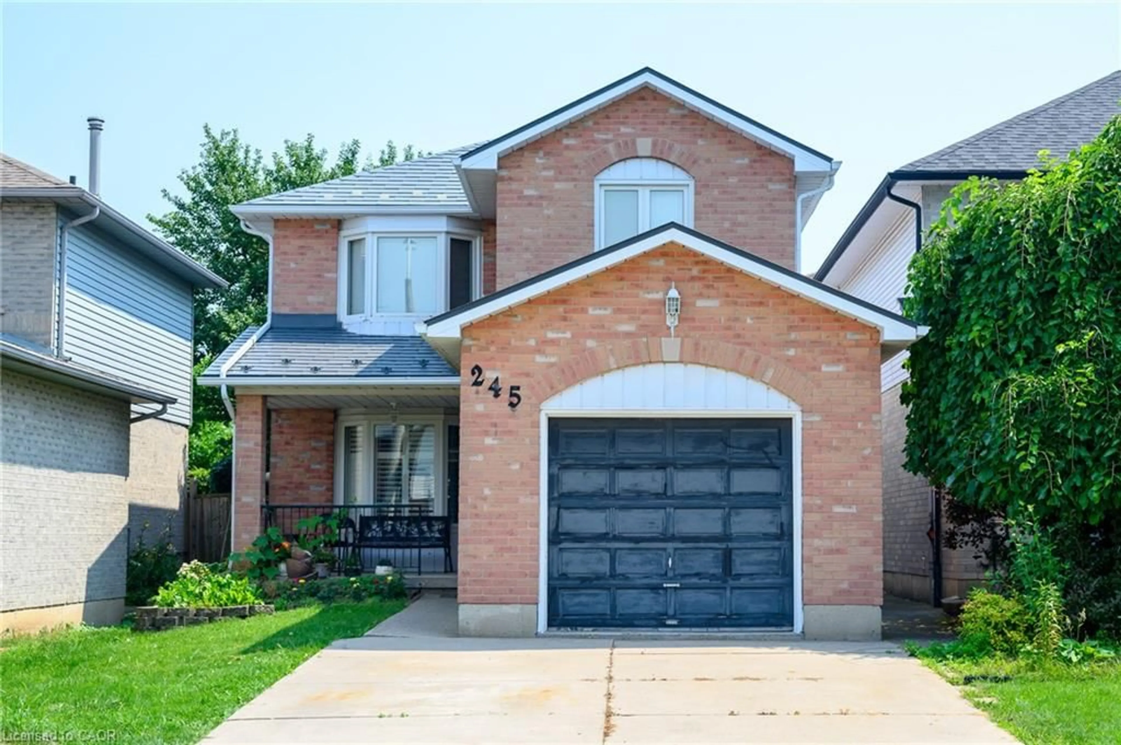 Home with brick exterior material, street for 245 Acadia Dr, Hamilton Ontario L8W 3L1