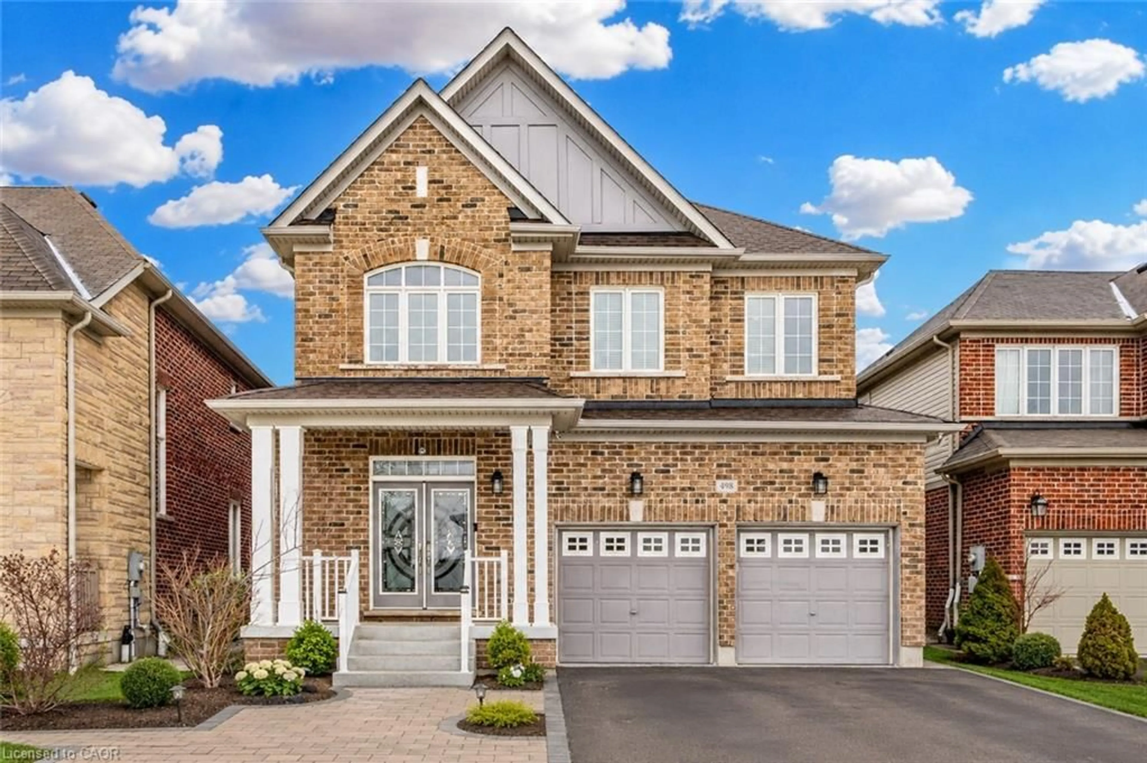 Home with brick exterior material, street for 498 Thomas Slee Dr, Kitchener Ontario N2P 2Y1