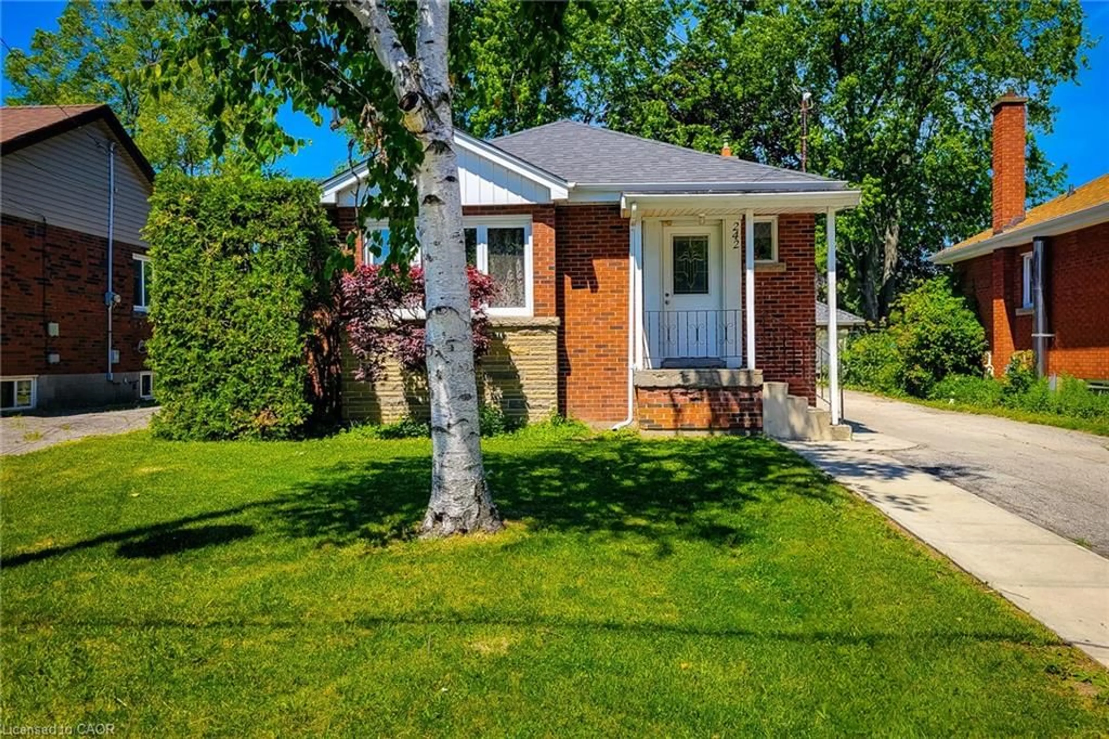 Home with brick exterior material, street for 242 West 2nd St, Hamilton Ontario L9C 3G5