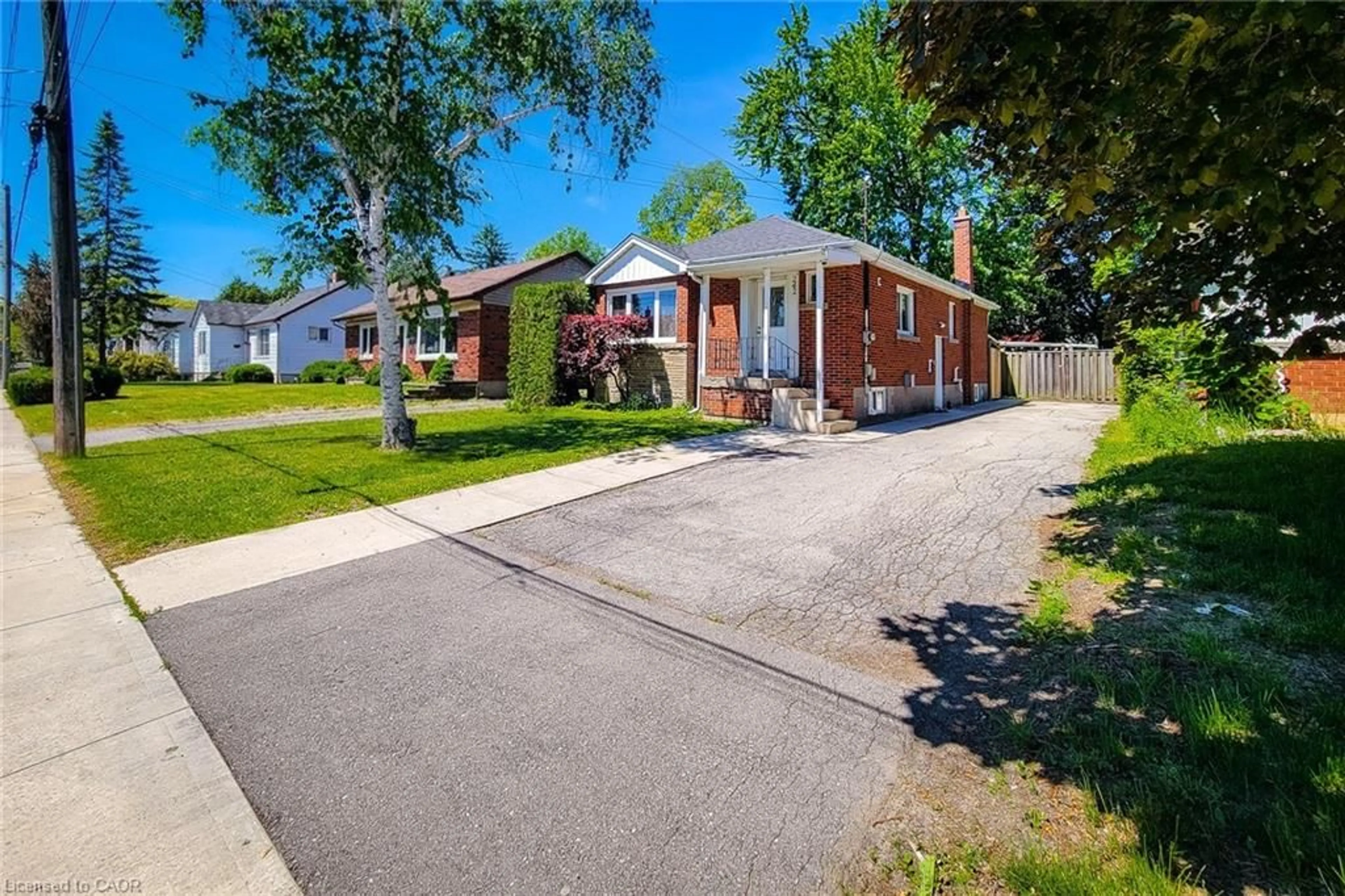 Home with brick exterior material, street for 242 West 2nd St, Hamilton Ontario L9C 3G5
