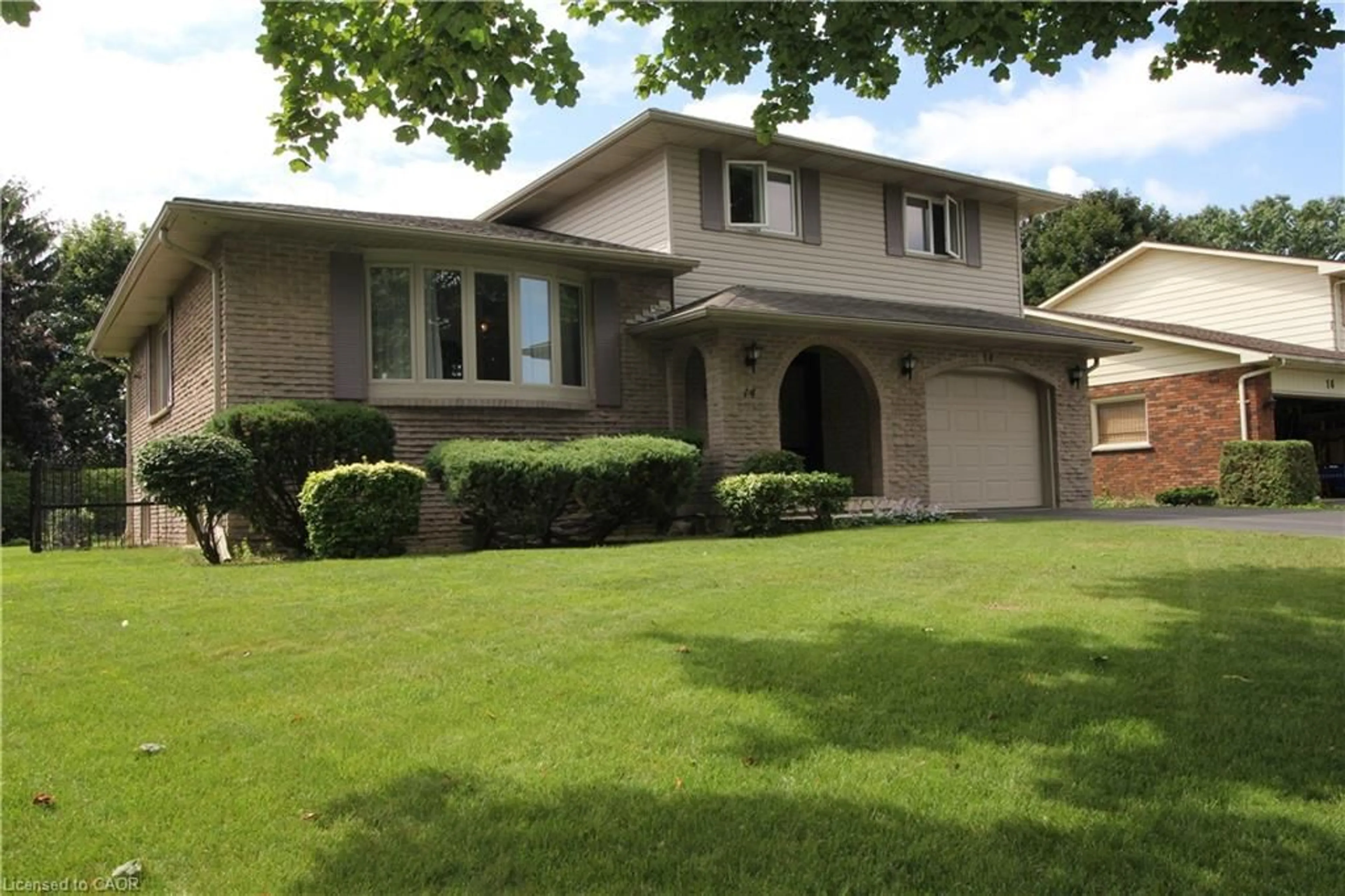Home with brick exterior material, street for 14 Berkley Cres, Simcoe Ontario N3Y 4T4