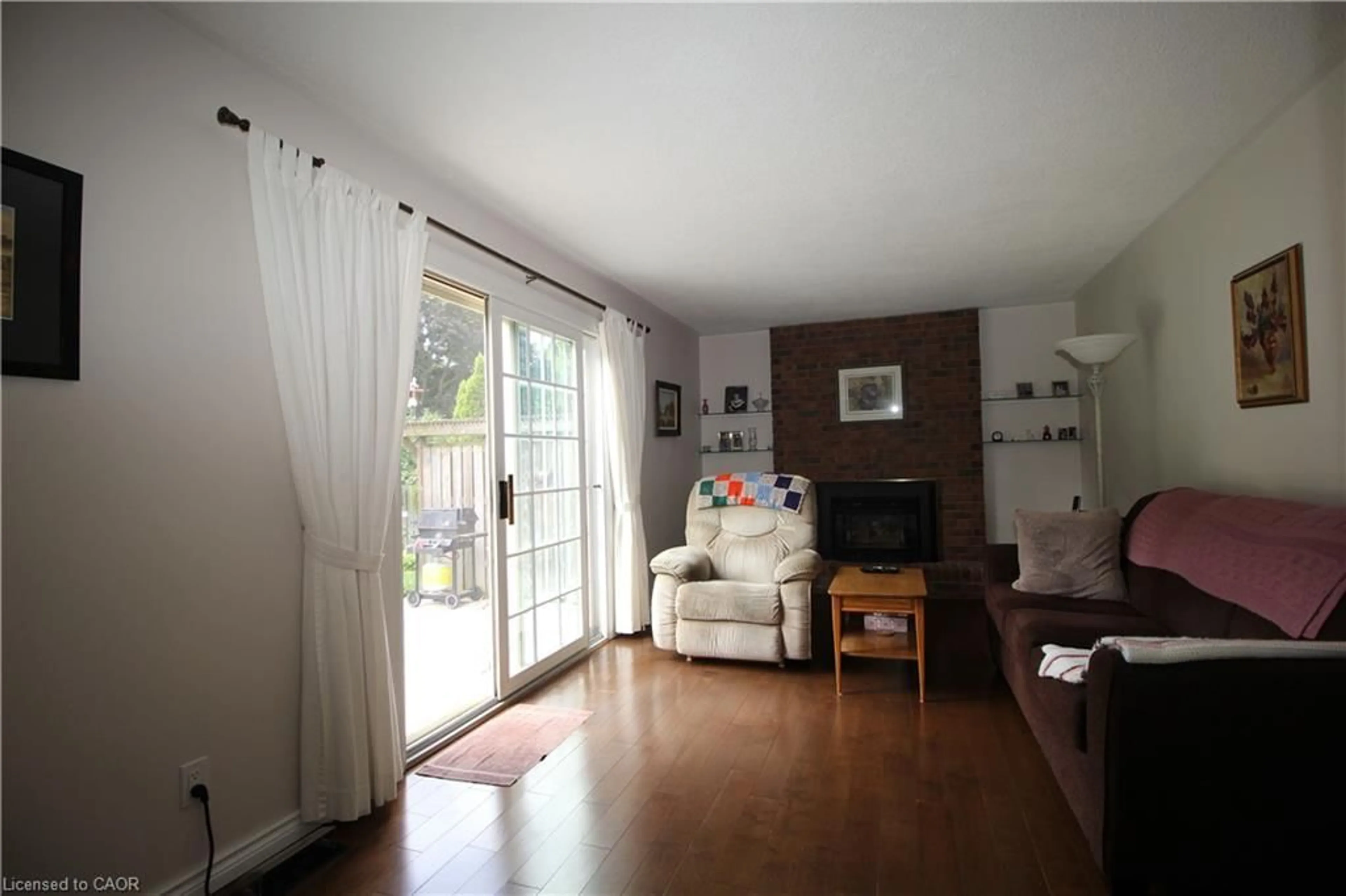 Living room with furniture, unknown for 14 Berkley Cres, Simcoe Ontario N3Y 4T4