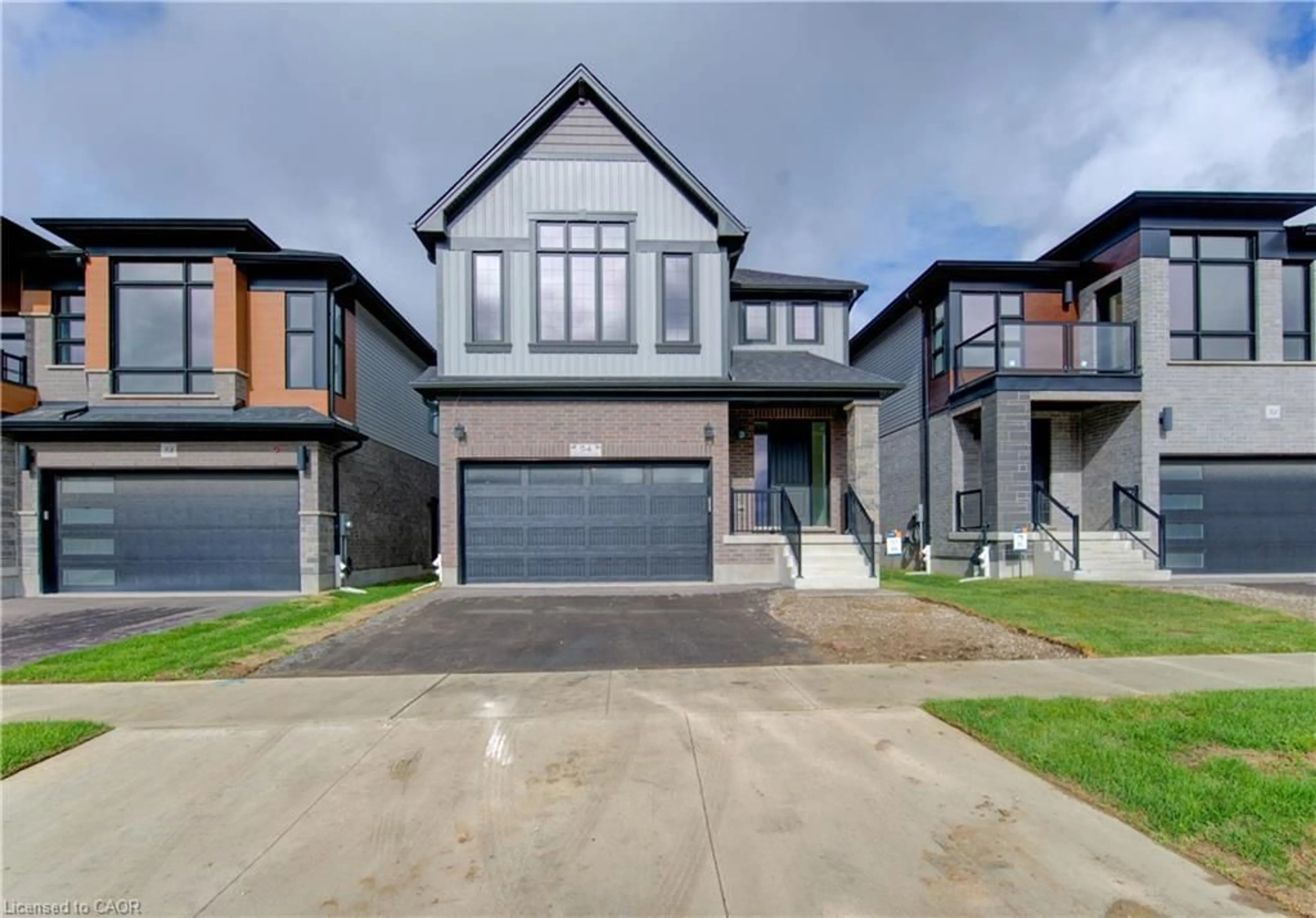 Home with brick exterior material, street for 54 Jacob Detweiller Dr, Kitchener Ontario N2P 0K7