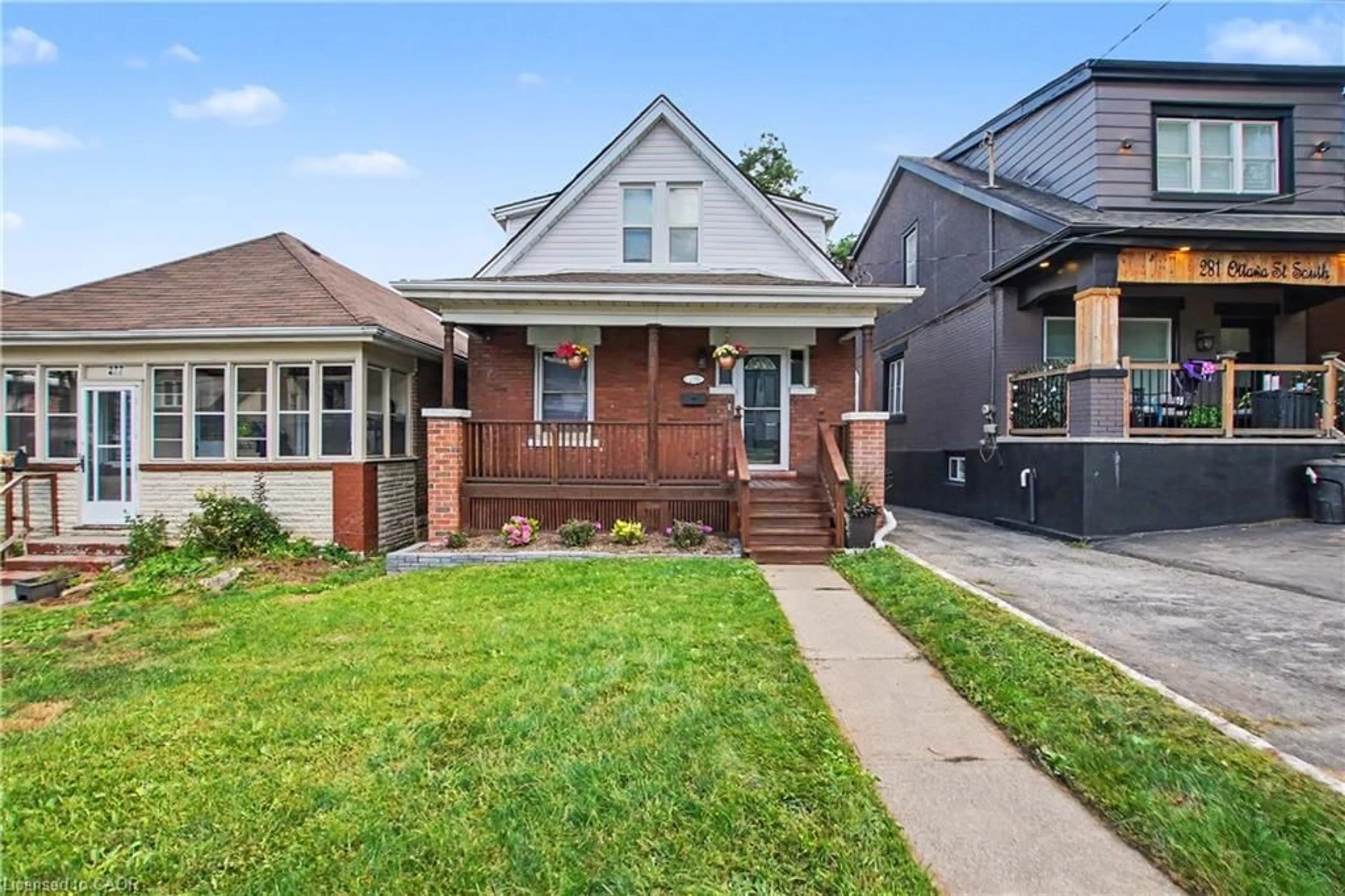 Home with brick exterior material, street for 279 Ottawa St, Hamilton Ontario L8K 2E9