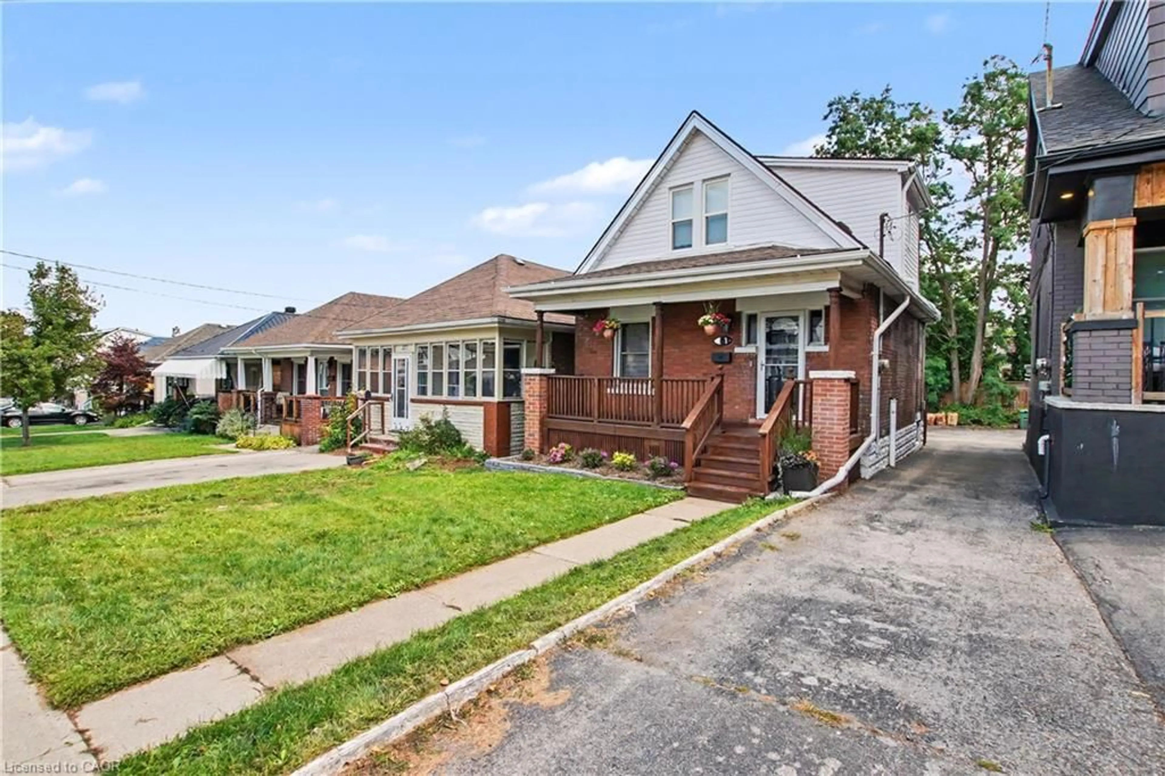Home with brick exterior material, street for 279 Ottawa St, Hamilton Ontario L8K 2E9