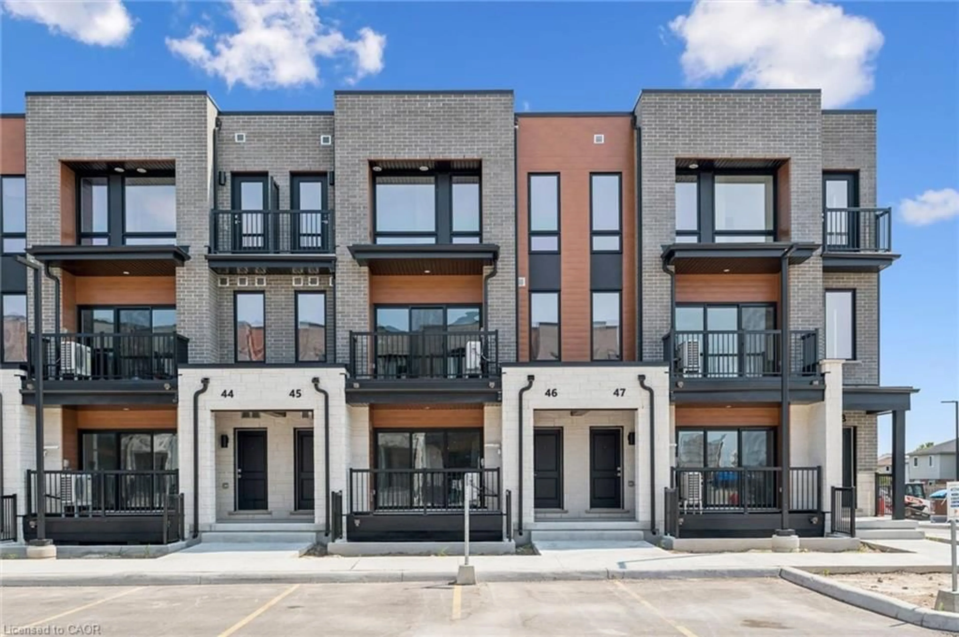 Home with brick exterior material, street for 525 Erinbrook Dr #B046, Kitchener Ontario N2E 0L4