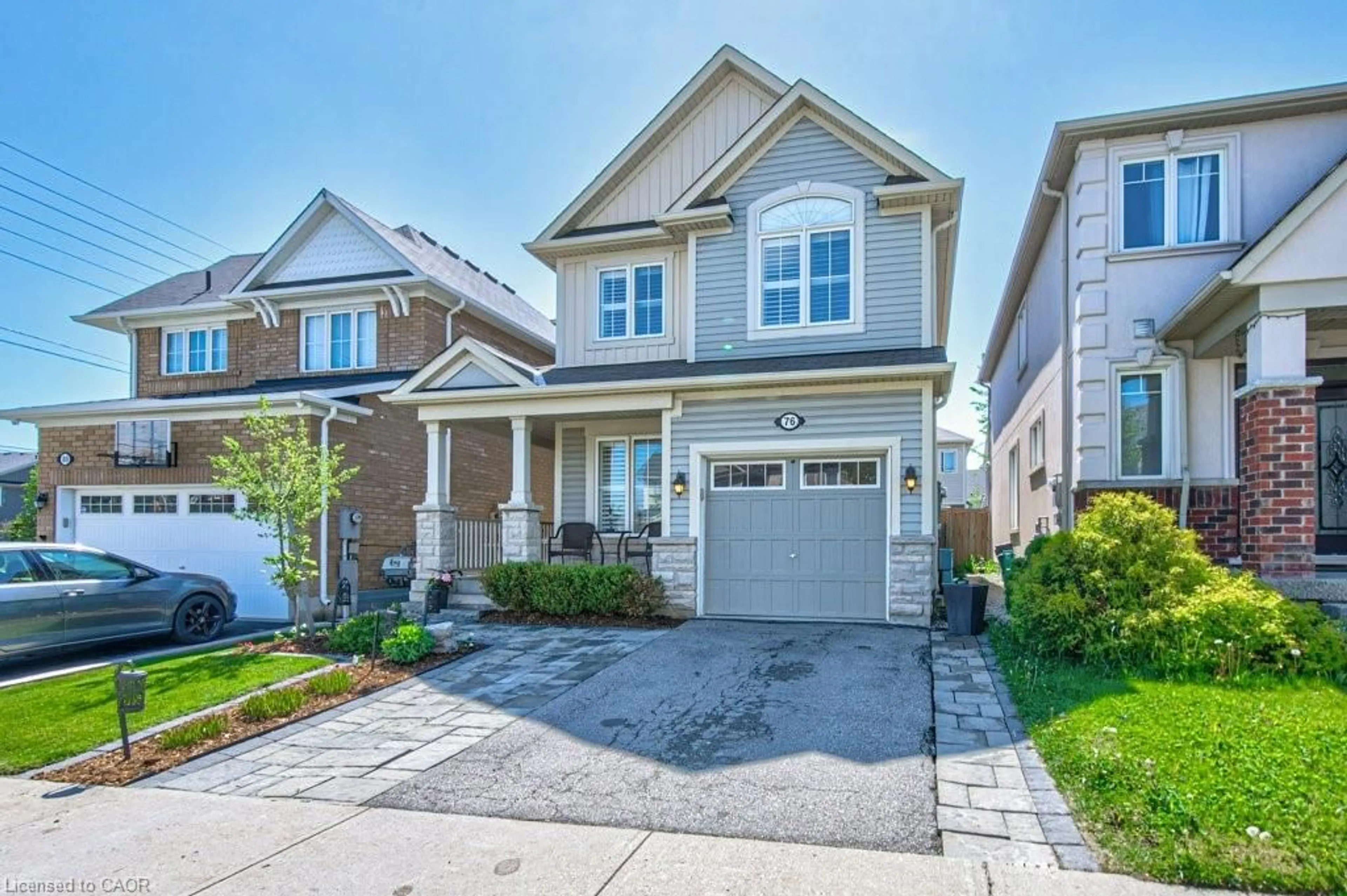 Home with vinyl exterior material, street for 76 Ruhl Dr, Milton Ontario L9T 8S4