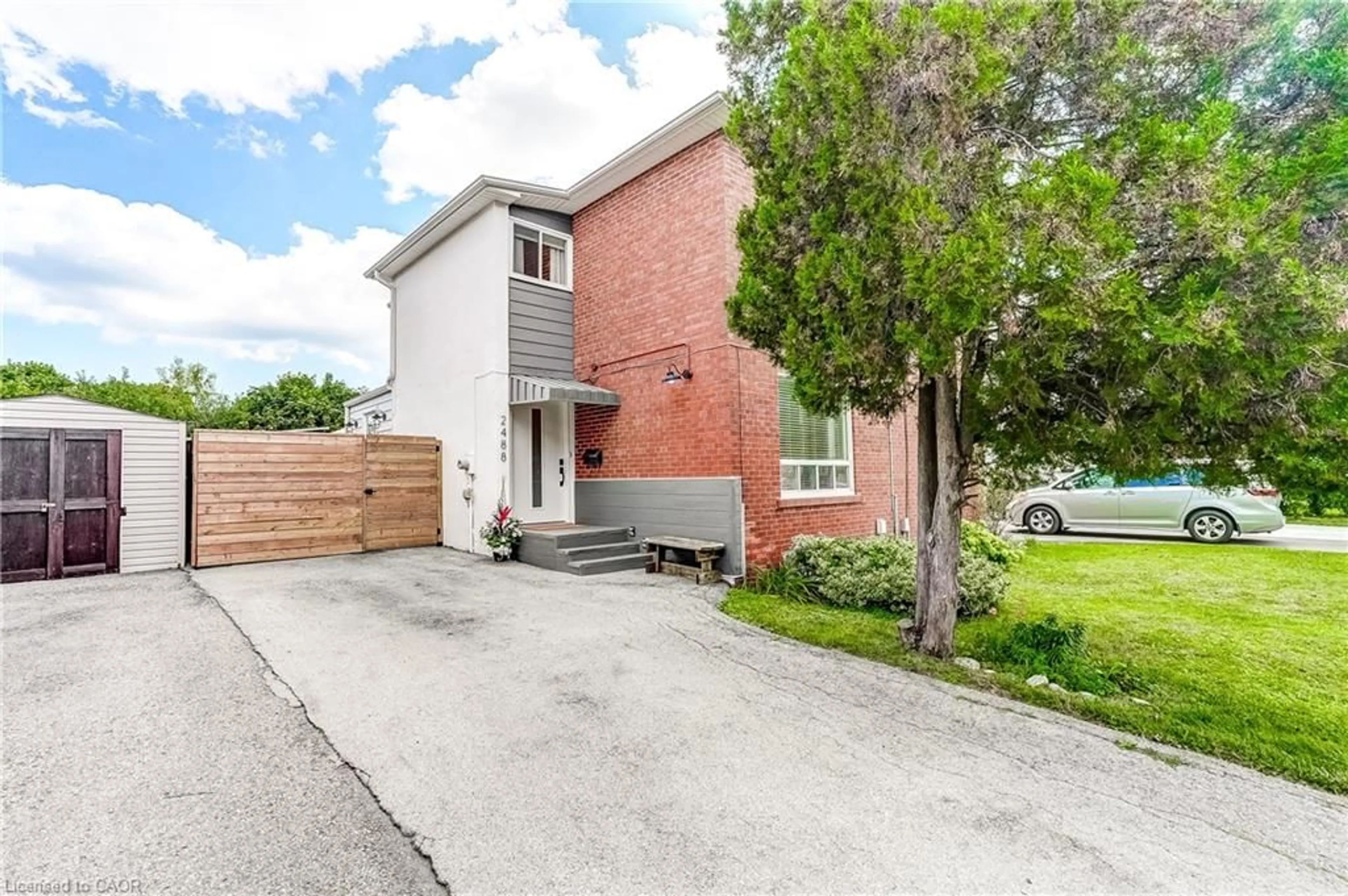 Home with brick exterior material, street for 2488 Brookhurst Rd, Mississauga Ontario L5J 1R3