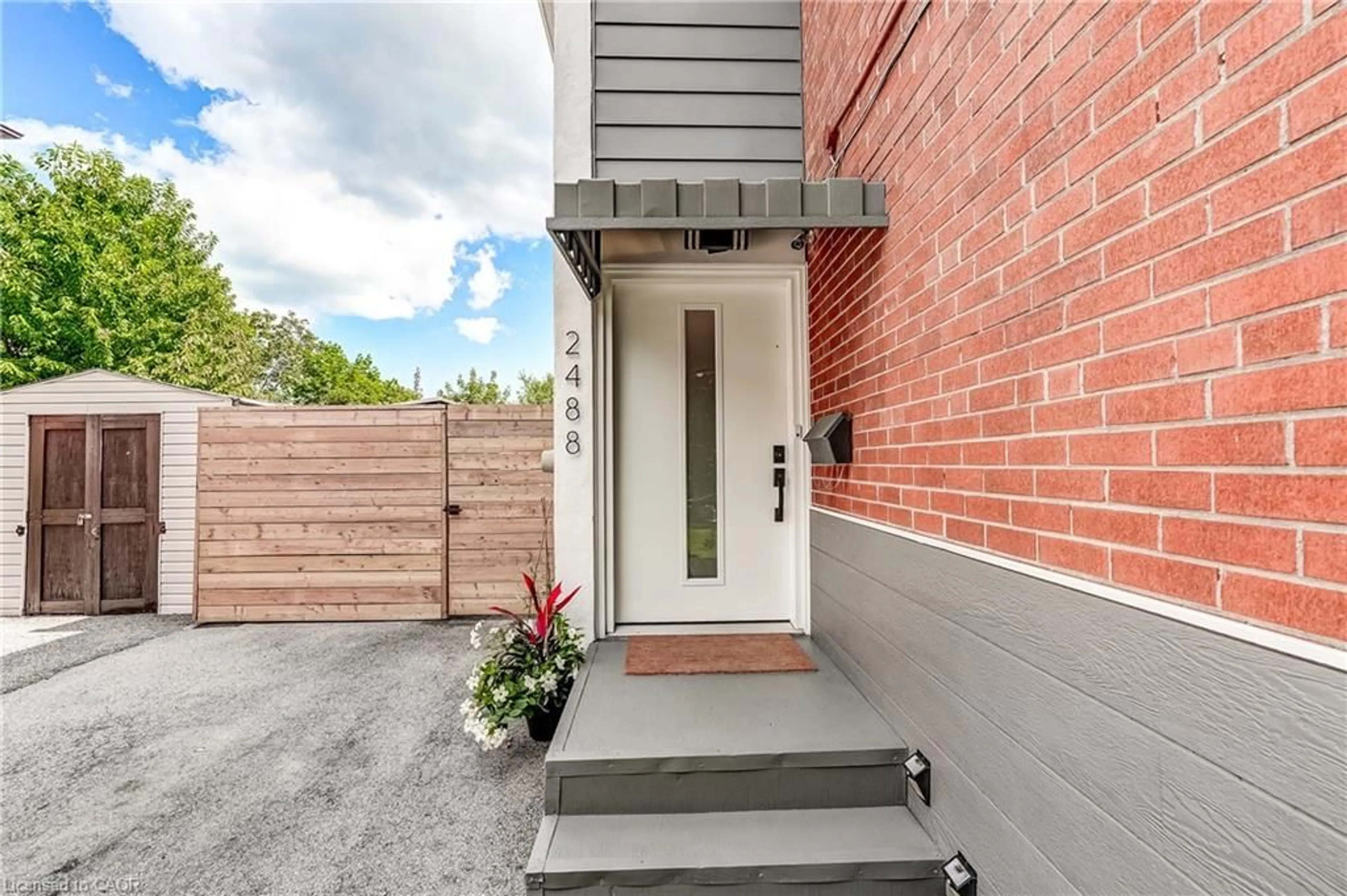 Home with brick exterior material, street for 2488 Brookhurst Rd, Mississauga Ontario L5J 1R3