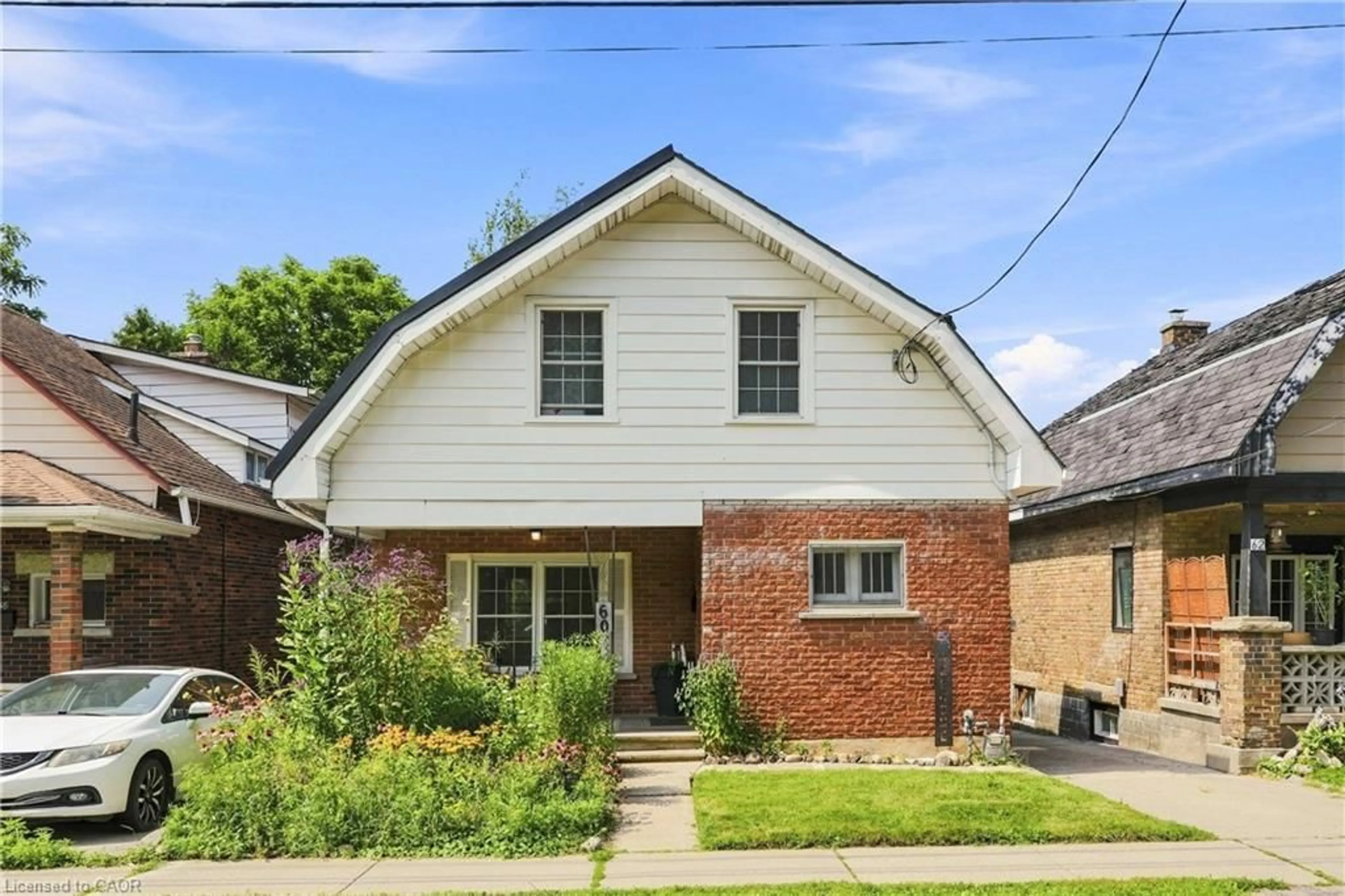 Home with brick exterior material, street for 60 Oliver St, Guelph Ontario N1E 3B5