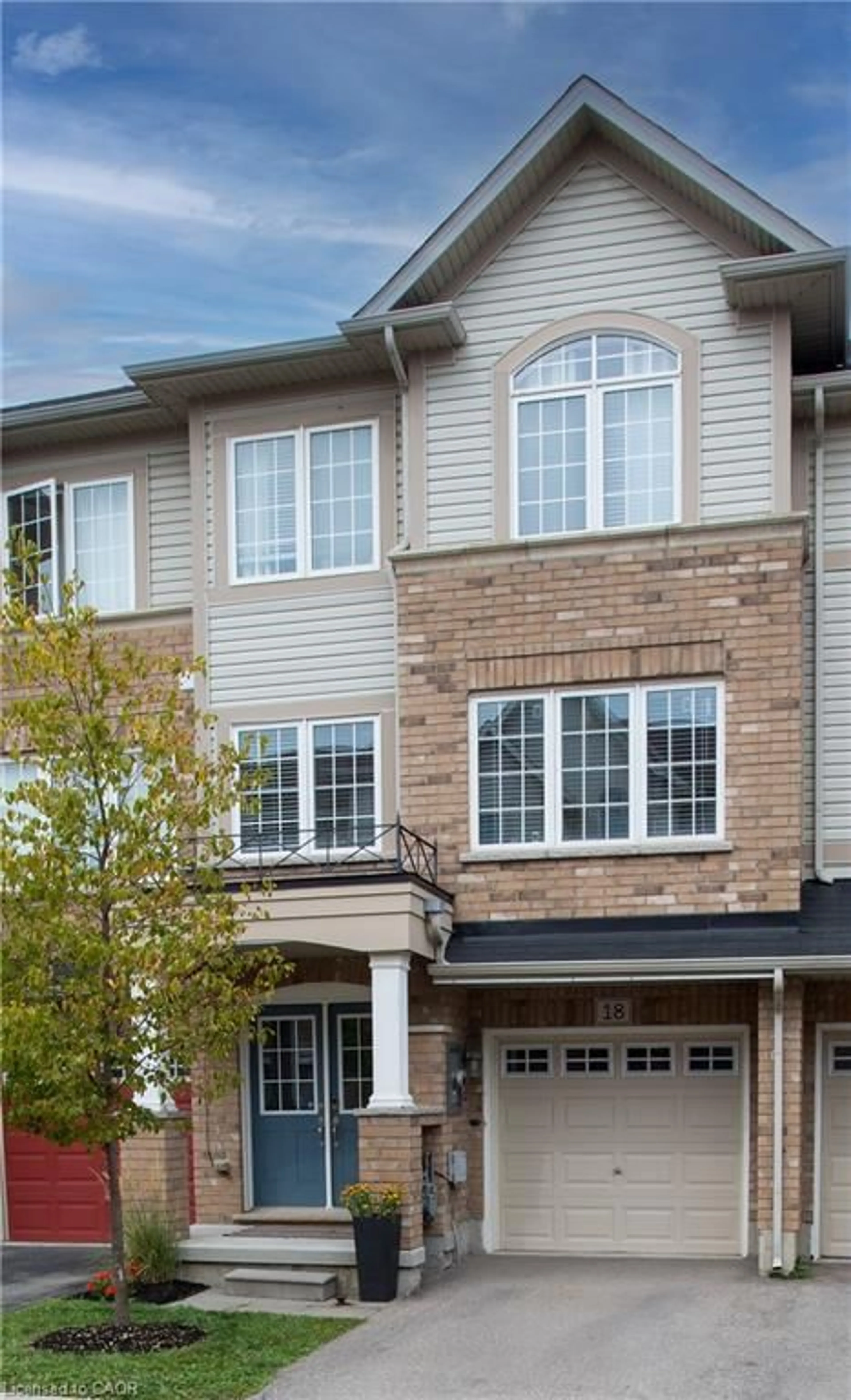 Home with brick exterior material, street for 18 England Terr, Stoney Creek Ontario L8J 0G4