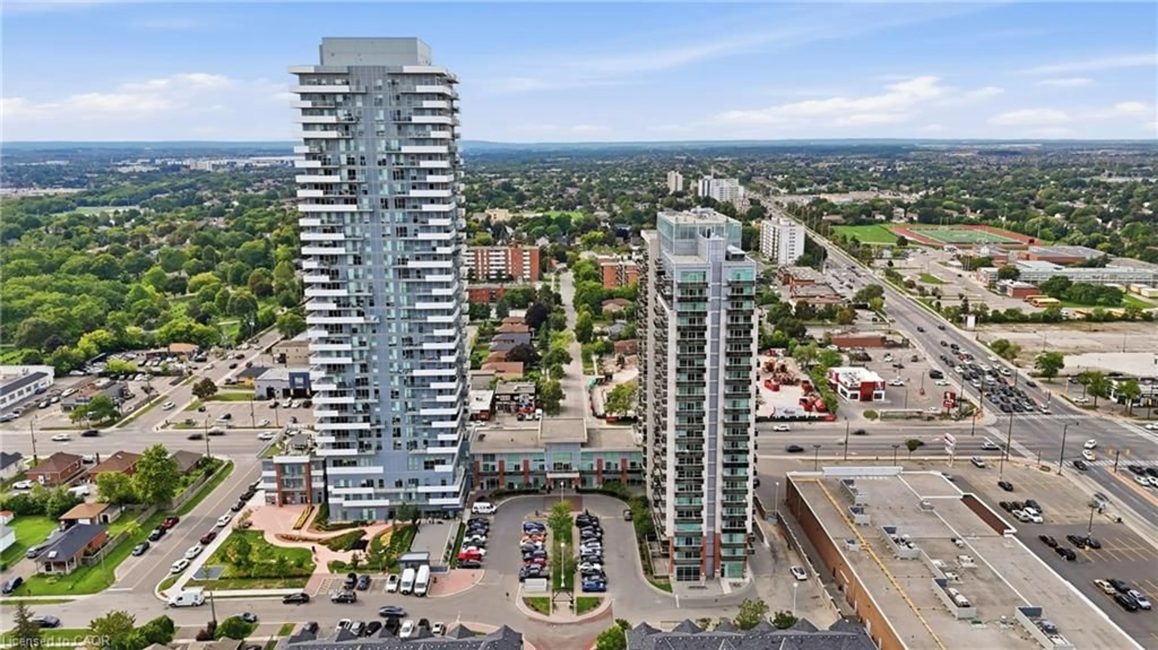A pic from outside/outdoor area/front of a property/back of a property/a pic from drone, city buildings view from balcony for 215 Queen St #225, Brampton Ontario L6W 0A9