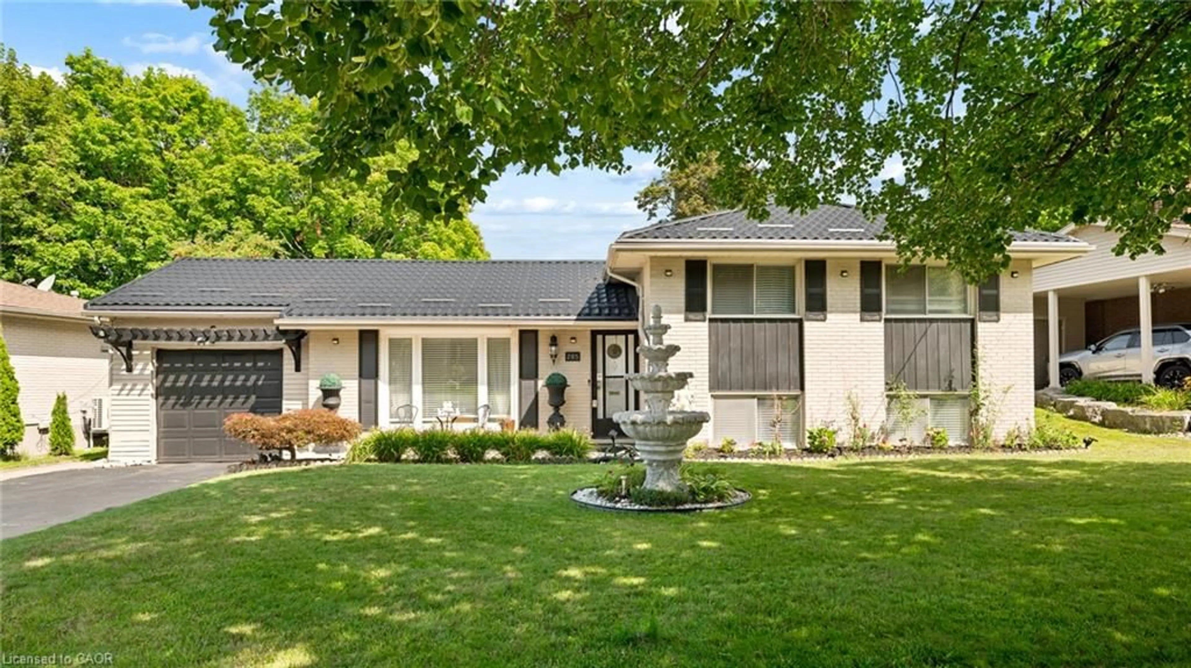 Home with vinyl exterior material, street for 285 Stonybrook Dr, Kitchener Ontario N2M 4L8