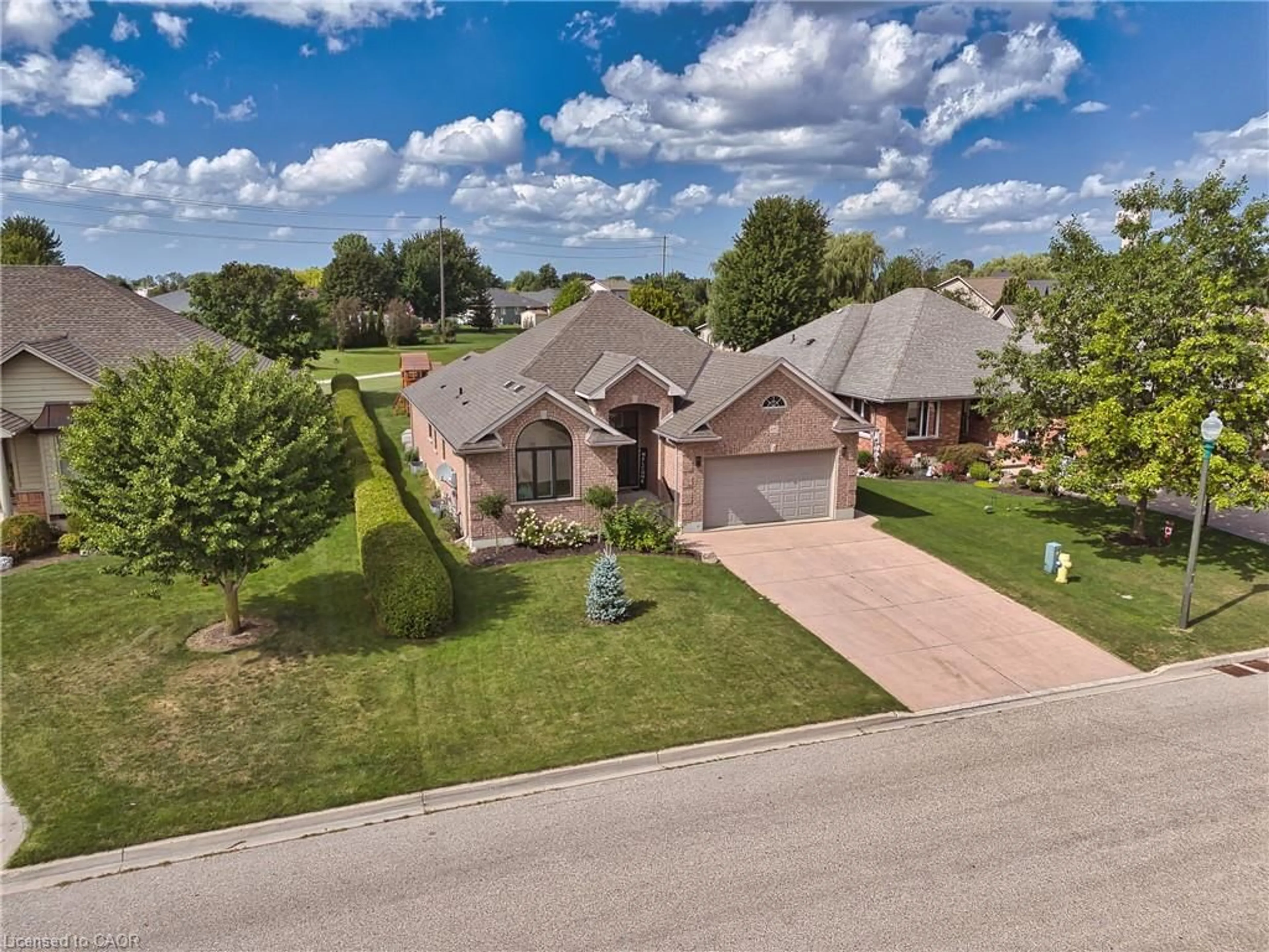 A pic from outside/outdoor area/front of a property/back of a property/a pic from drone, street for 635 Riverview Dr, Listowel Ontario N4W 3T7