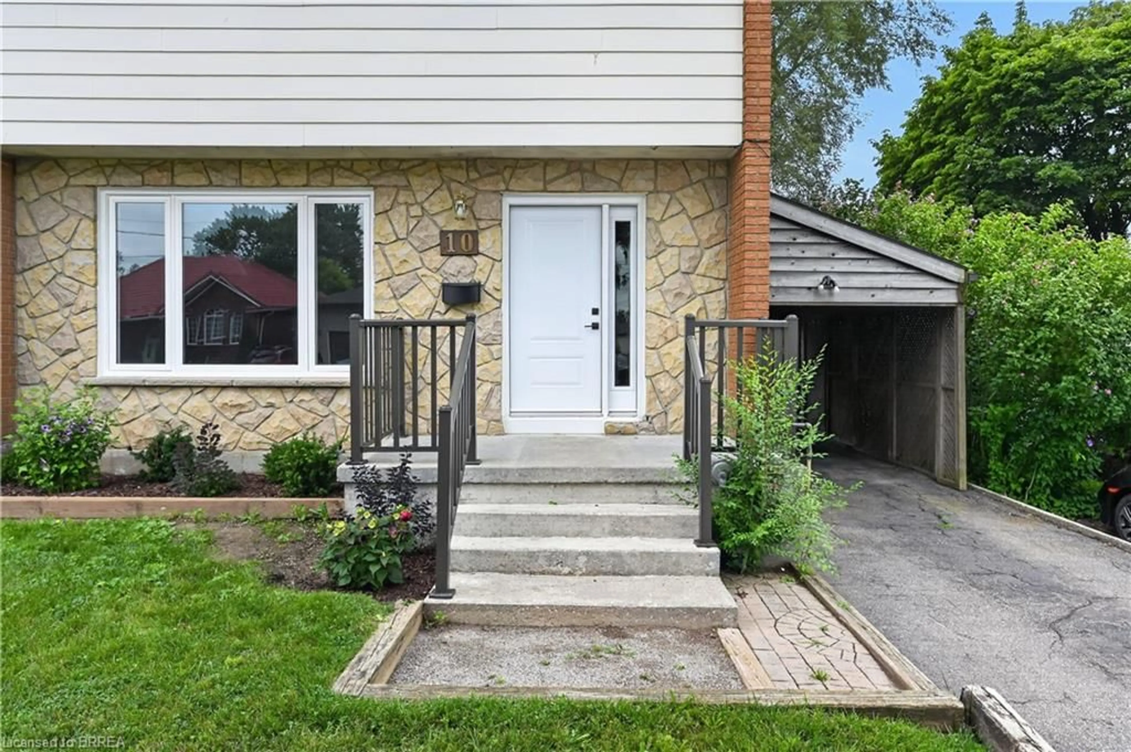 Home with brick exterior material, street for 10 Elmwood Ave, Brantford Ontario N3R 2J8