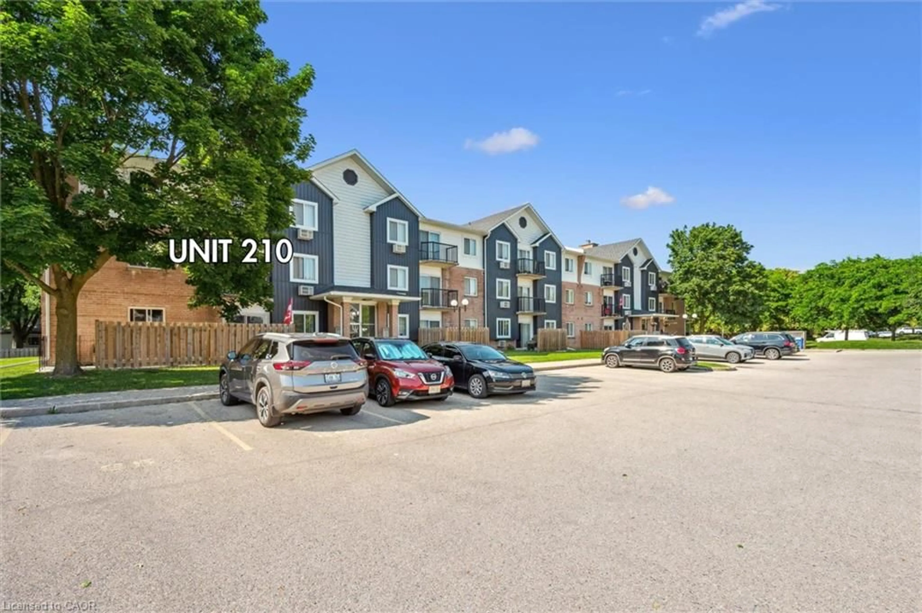 A pic from outside/outdoor area/front of a property/back of a property/a pic from drone, street for 275 Eiwo Crt #210, Waterloo Ontario N2K 2M8