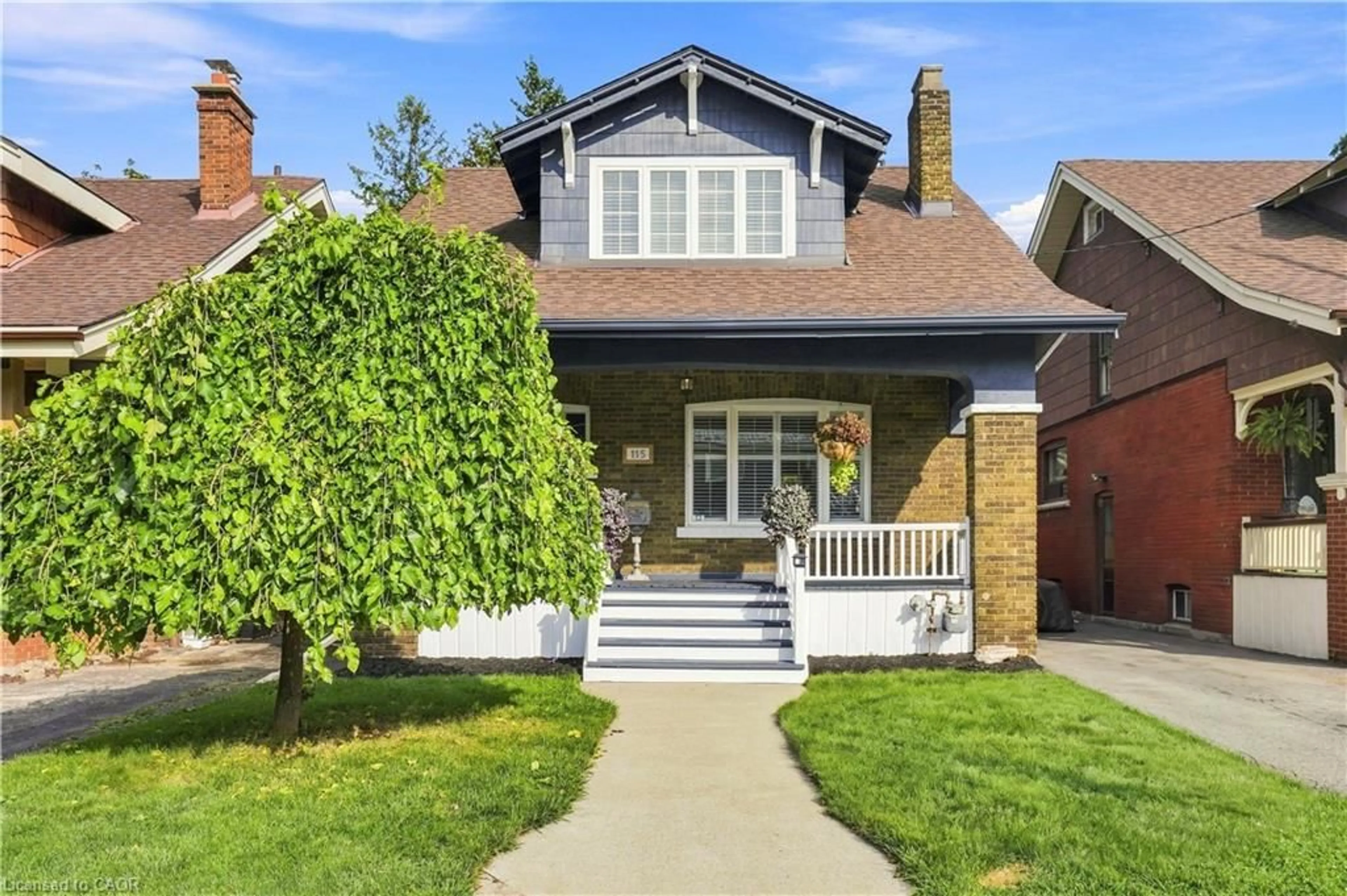 Home with brick exterior material, street for 115 Kensington Ave, Hamilton Ontario L8M 3H1
