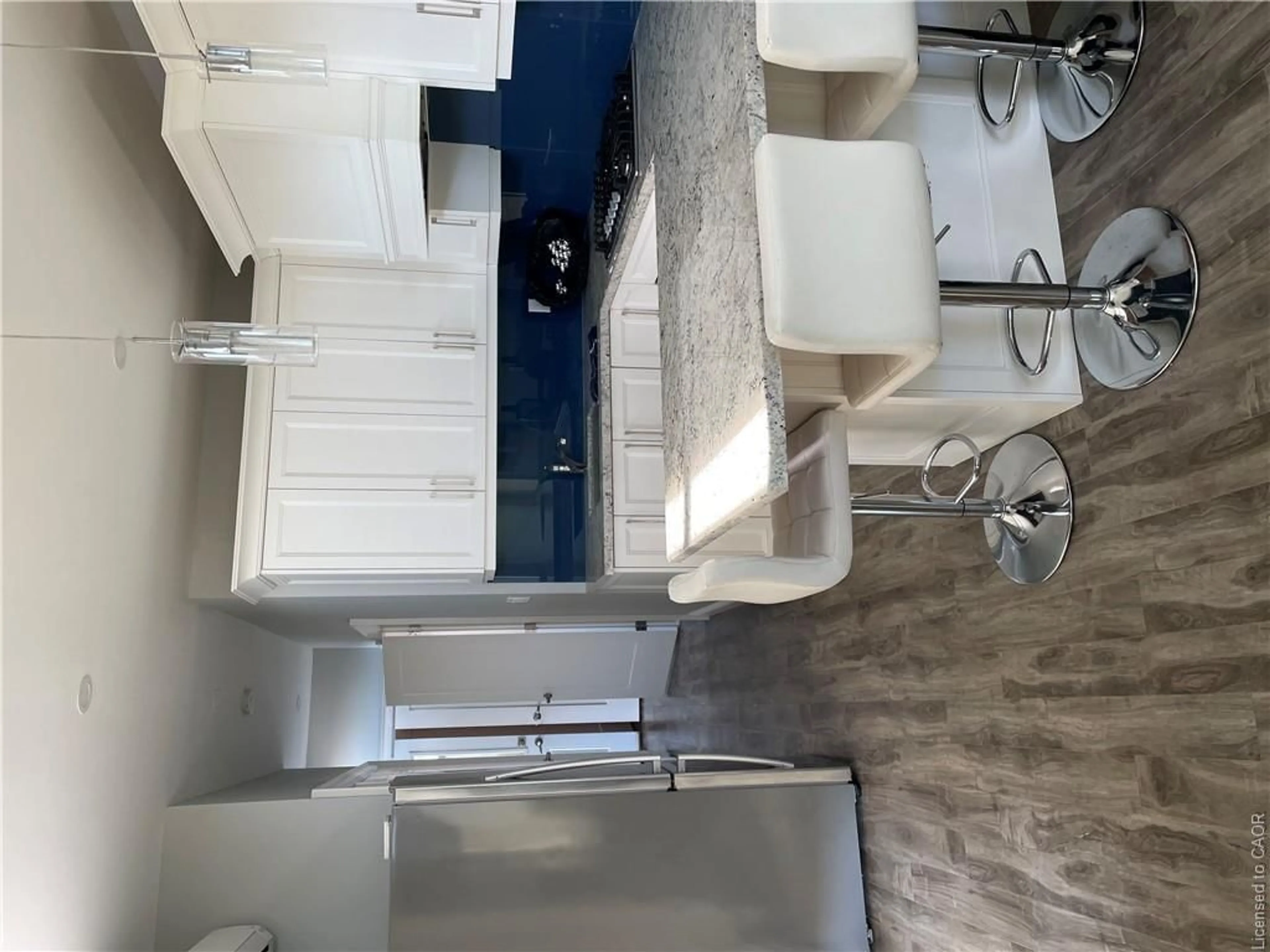 Kitchen with laundary machines, unknown for 5 Town Line St #103, St. Williams Ontario N0E 1P0