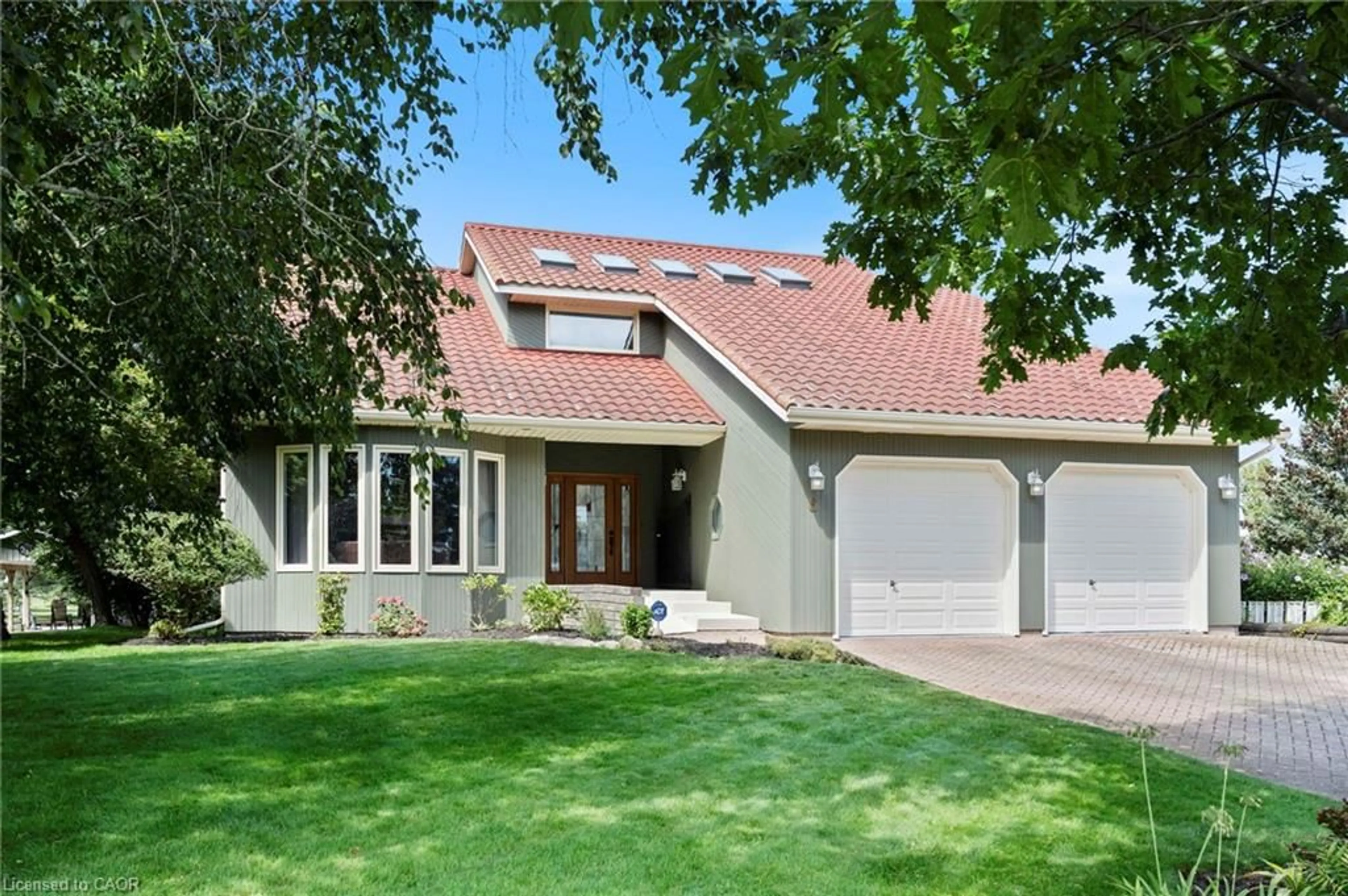 Home with vinyl exterior material, street for 6 Howey Ave, Long Point Ontario N0E 1M0