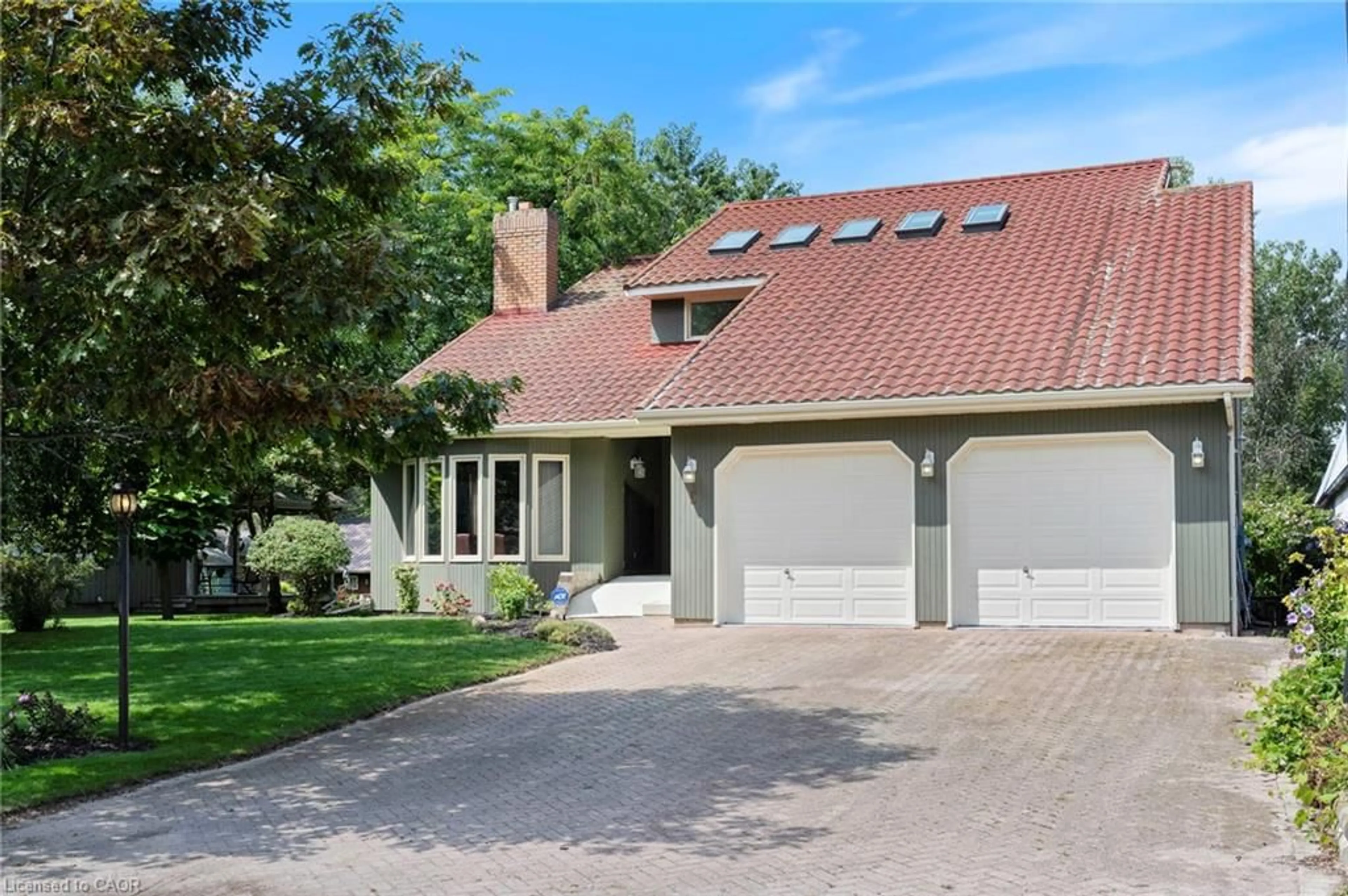 Home with brick exterior material, street for 6 Howey Ave, Long Point Ontario N0E 1M0