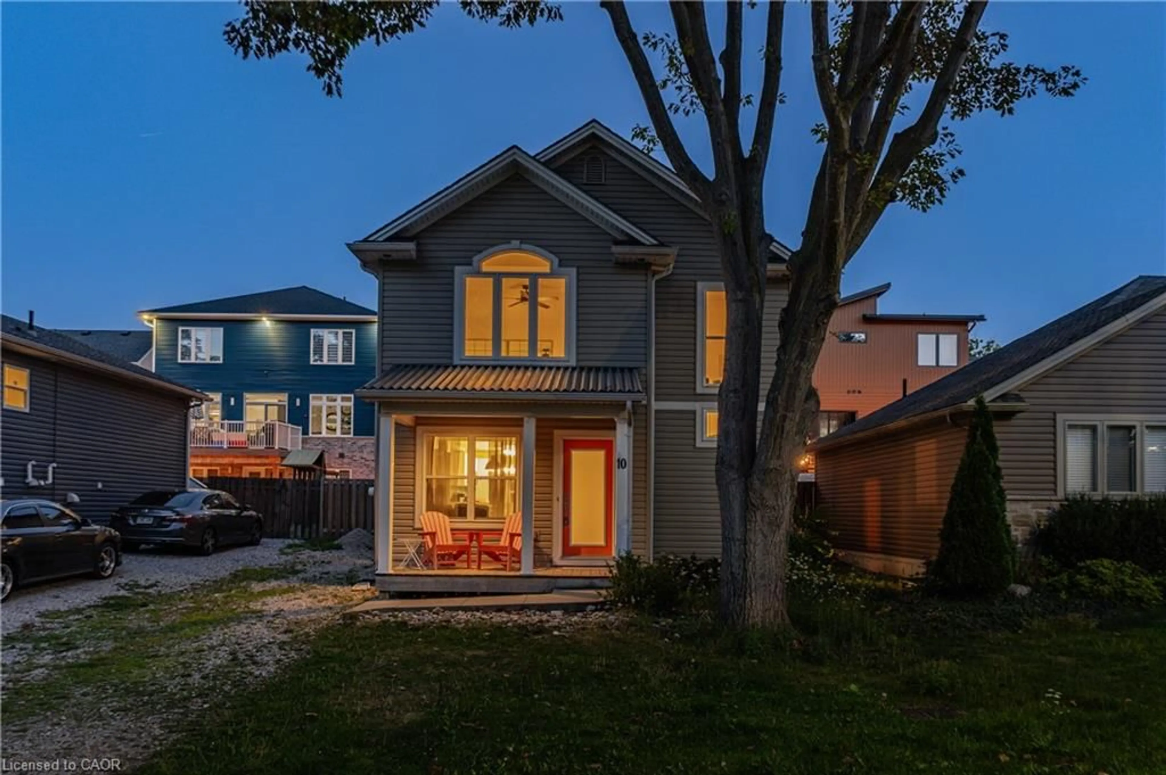 Home with brick exterior material, street for 10 Queens Ave, Grand Bend Ontario N0M 1T0