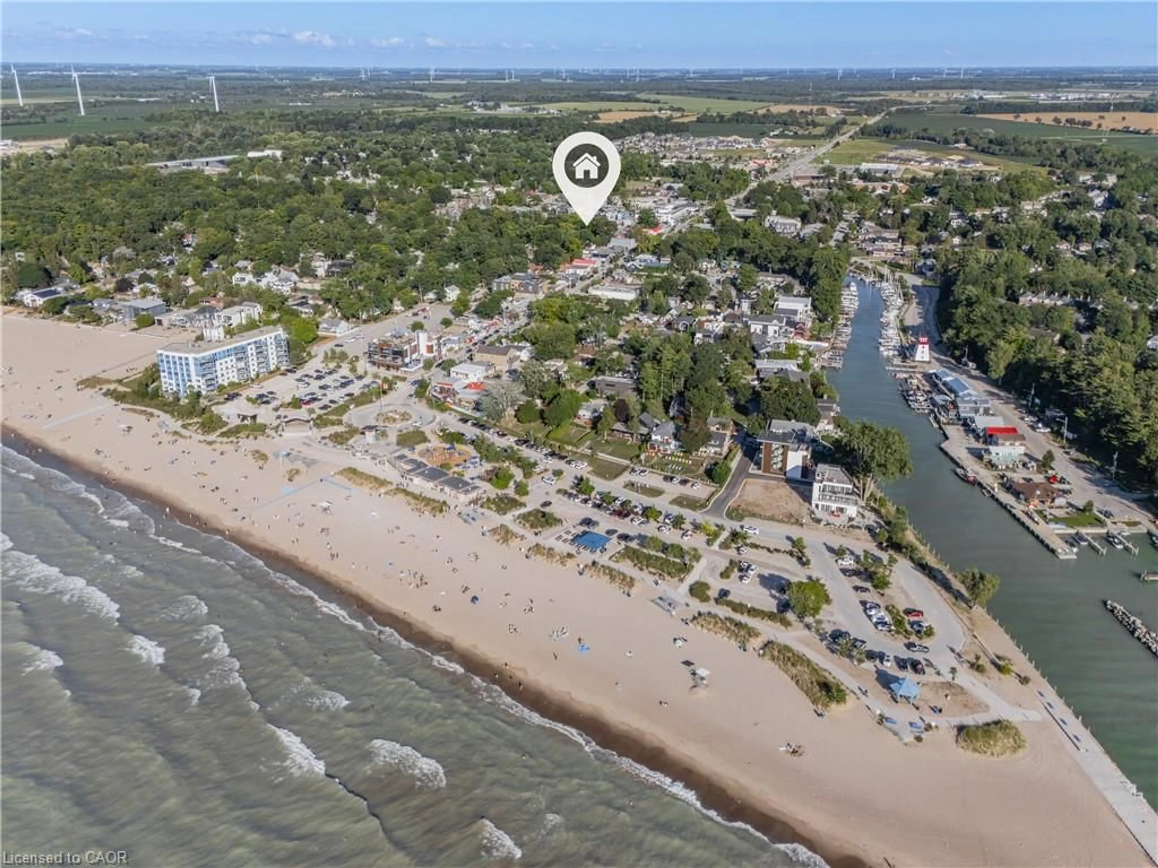 A pic from outside/outdoor area/front of a property/back of a property/a pic from drone, water/lake/river/ocean view for 10 Queens Ave, Grand Bend Ontario N0M 1T0