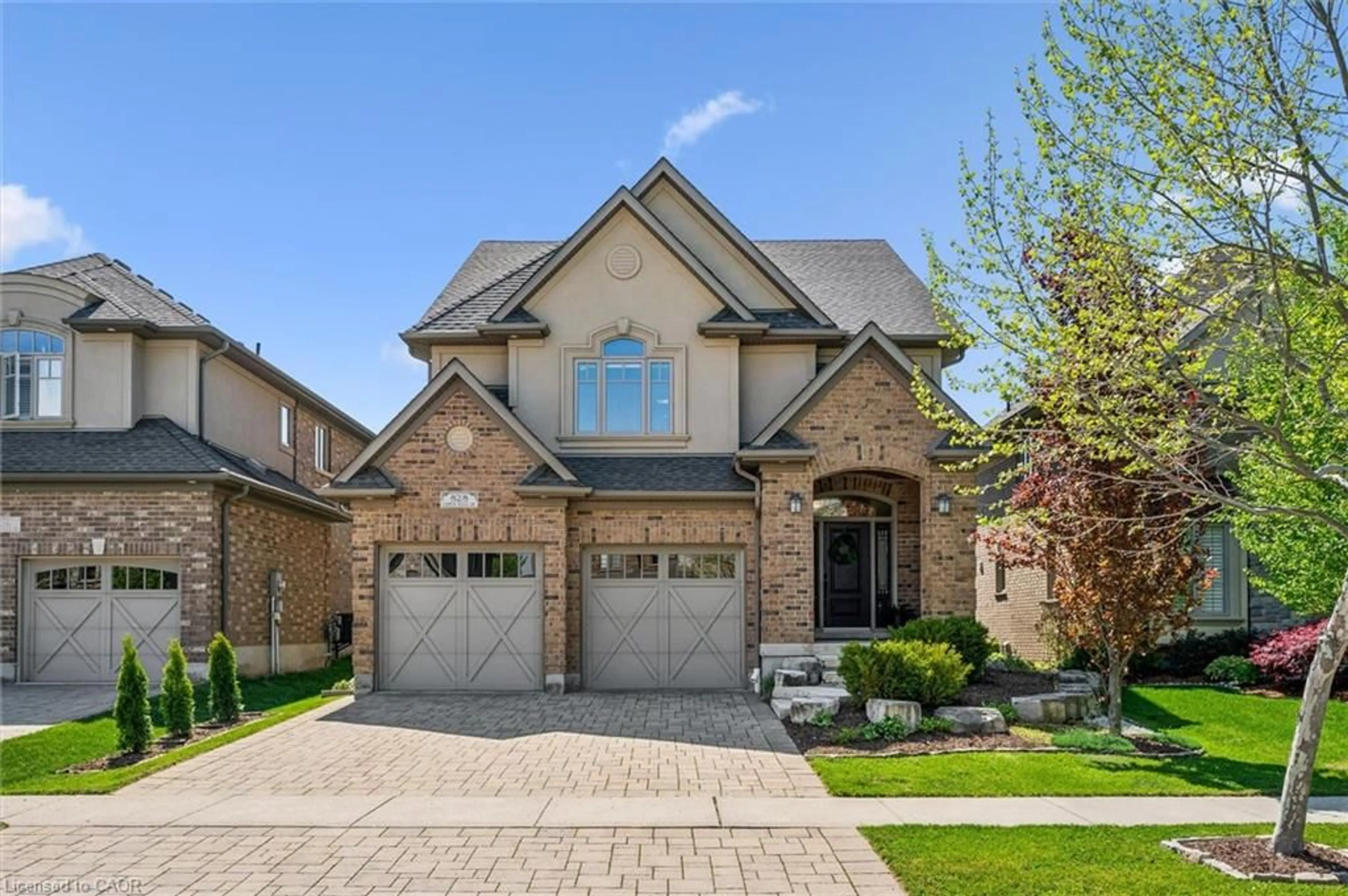 Home with brick exterior material, street for 828 Copper Ridge Dr, Waterloo Ontario N2K 0B5