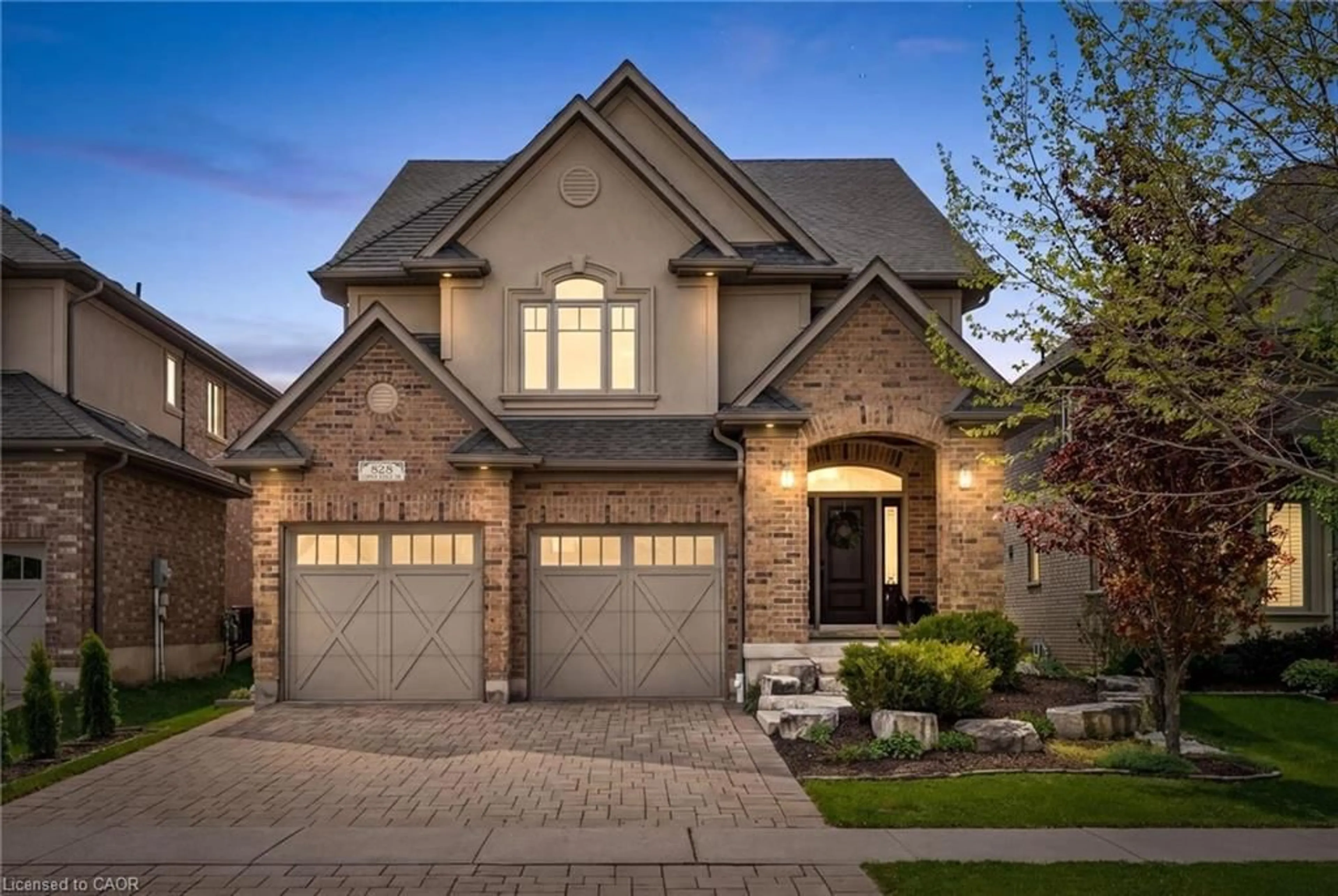 Home with brick exterior material, street for 828 Copper Ridge Dr, Waterloo Ontario N2K 0B5