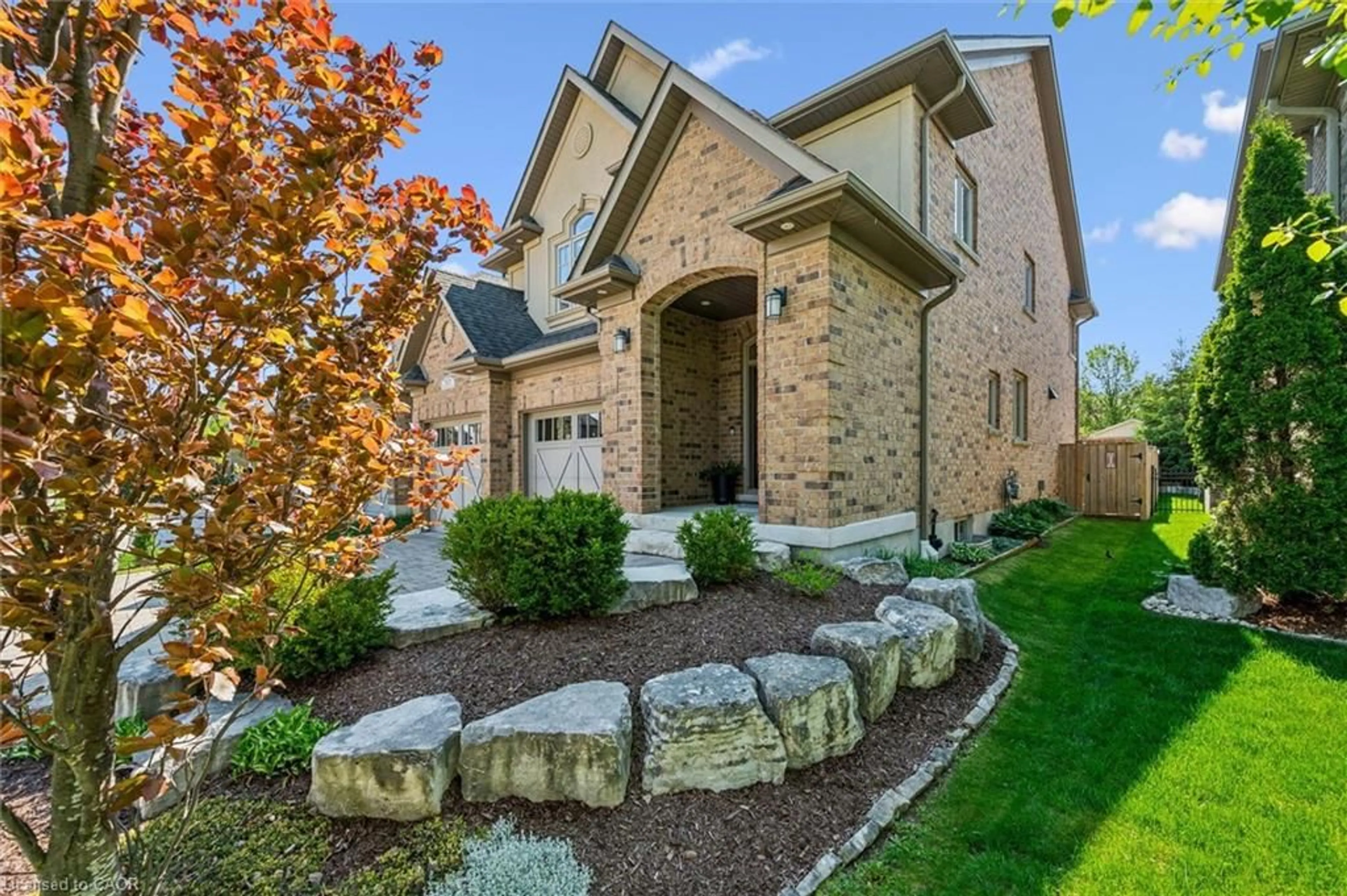 Home with brick exterior material, street for 828 Copper Ridge Dr, Waterloo Ontario N2K 0B5