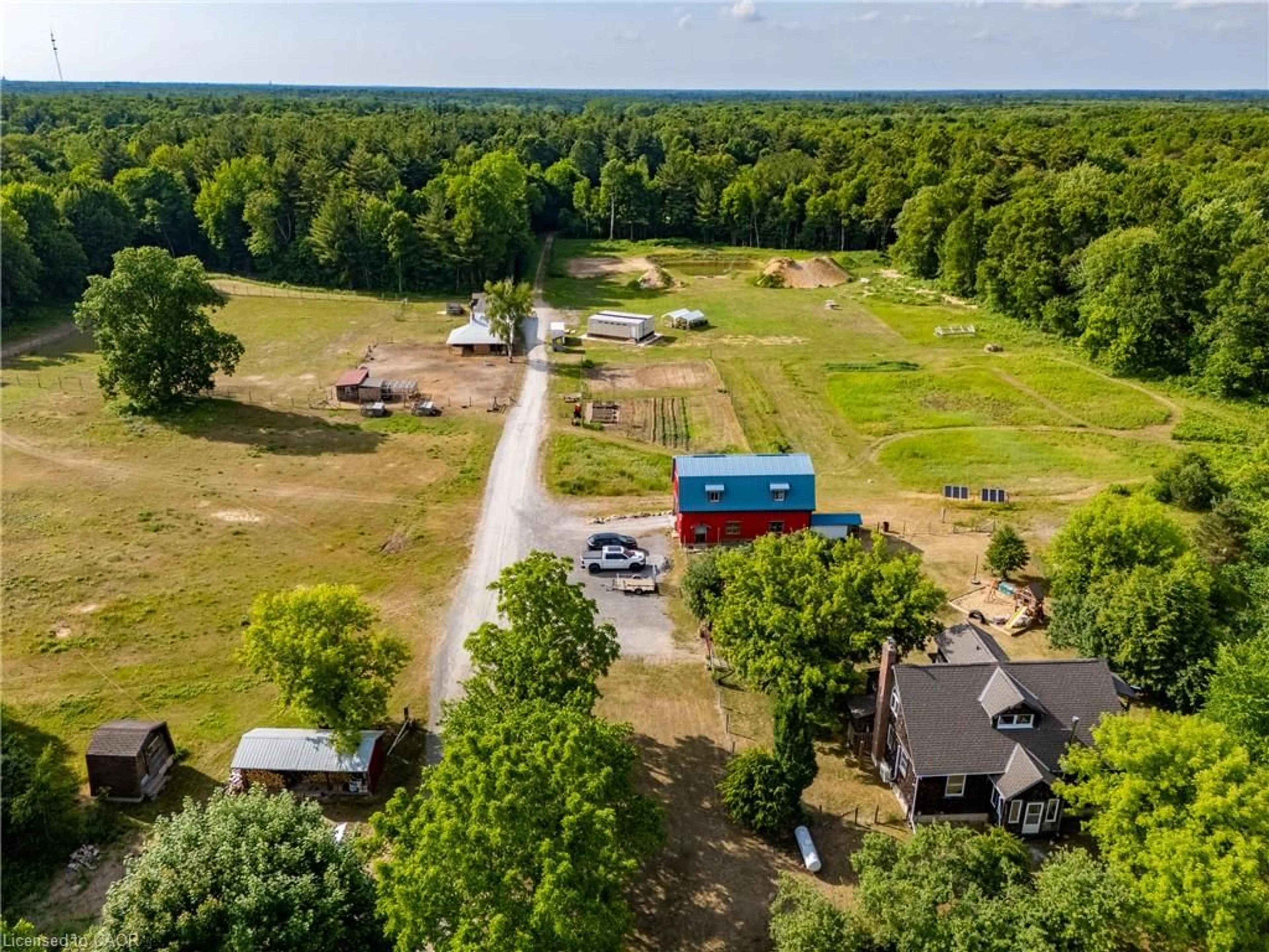A pic from outside/outdoor area/front of a property/back of a property/a pic from drone, unknown for 1353 Charlotteville Road 8, Simcoe Ontario N3Y 2K5