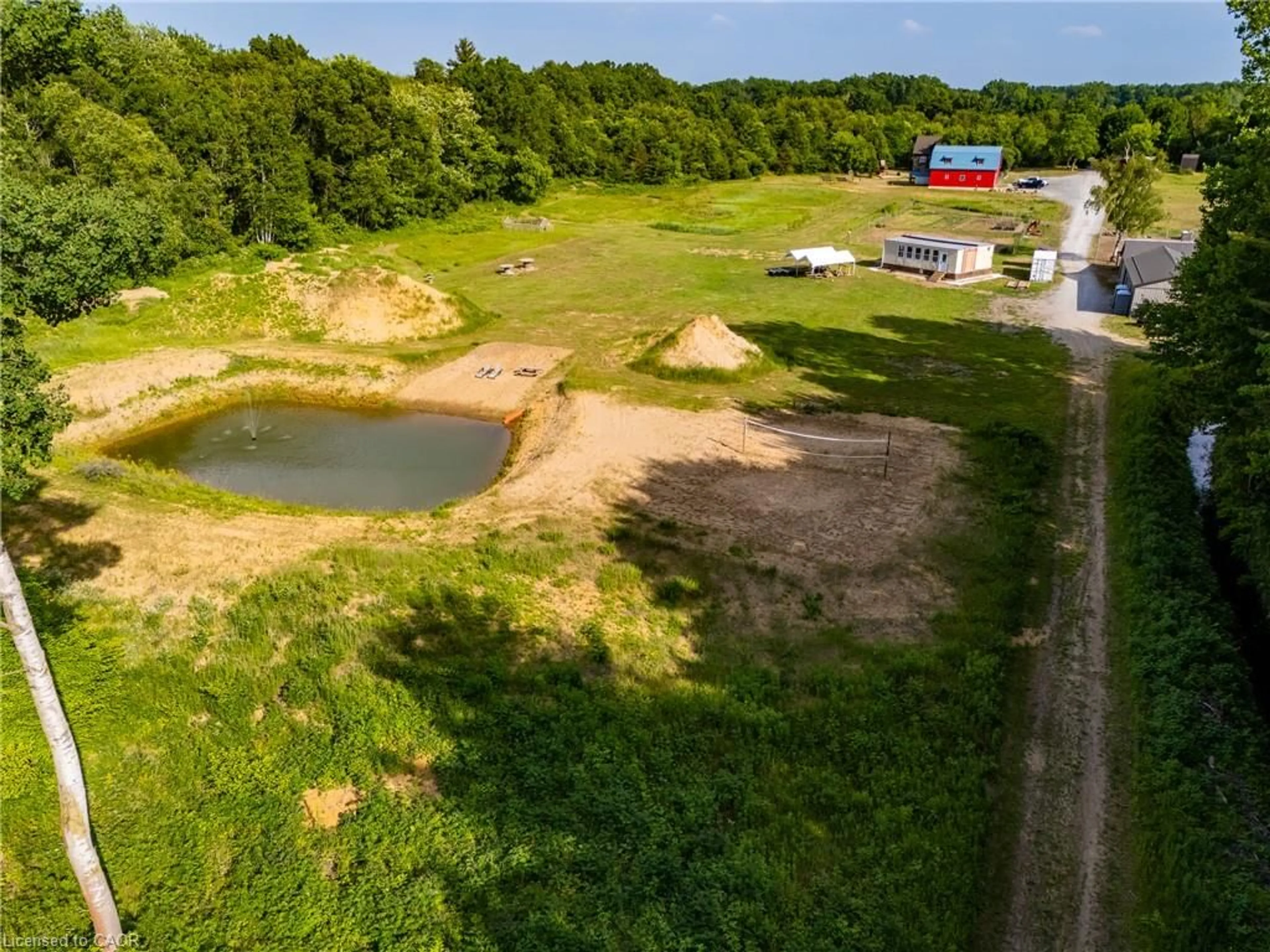 A pic from outside/outdoor area/front of a property/back of a property/a pic from drone, water/lake/river/ocean view for 1353 Charlotteville Road 8, Simcoe Ontario N3Y 2K5