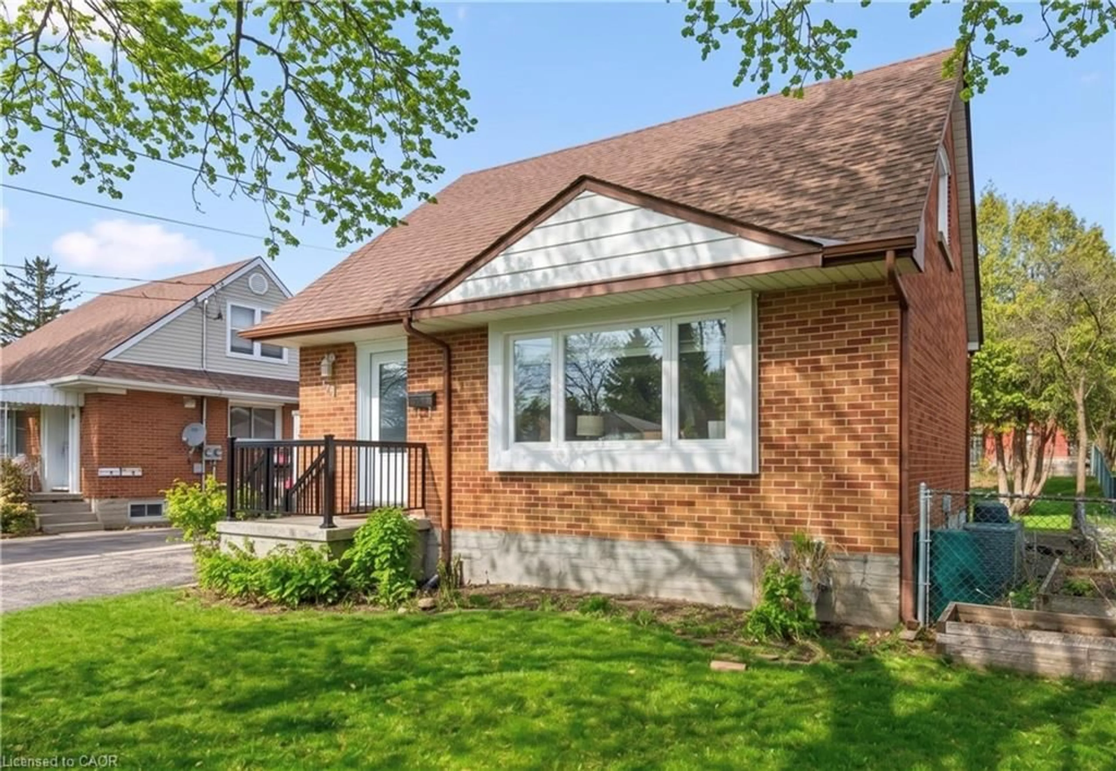 Home with brick exterior material, street for 103 William St, Guelph Ontario N1E 5G2