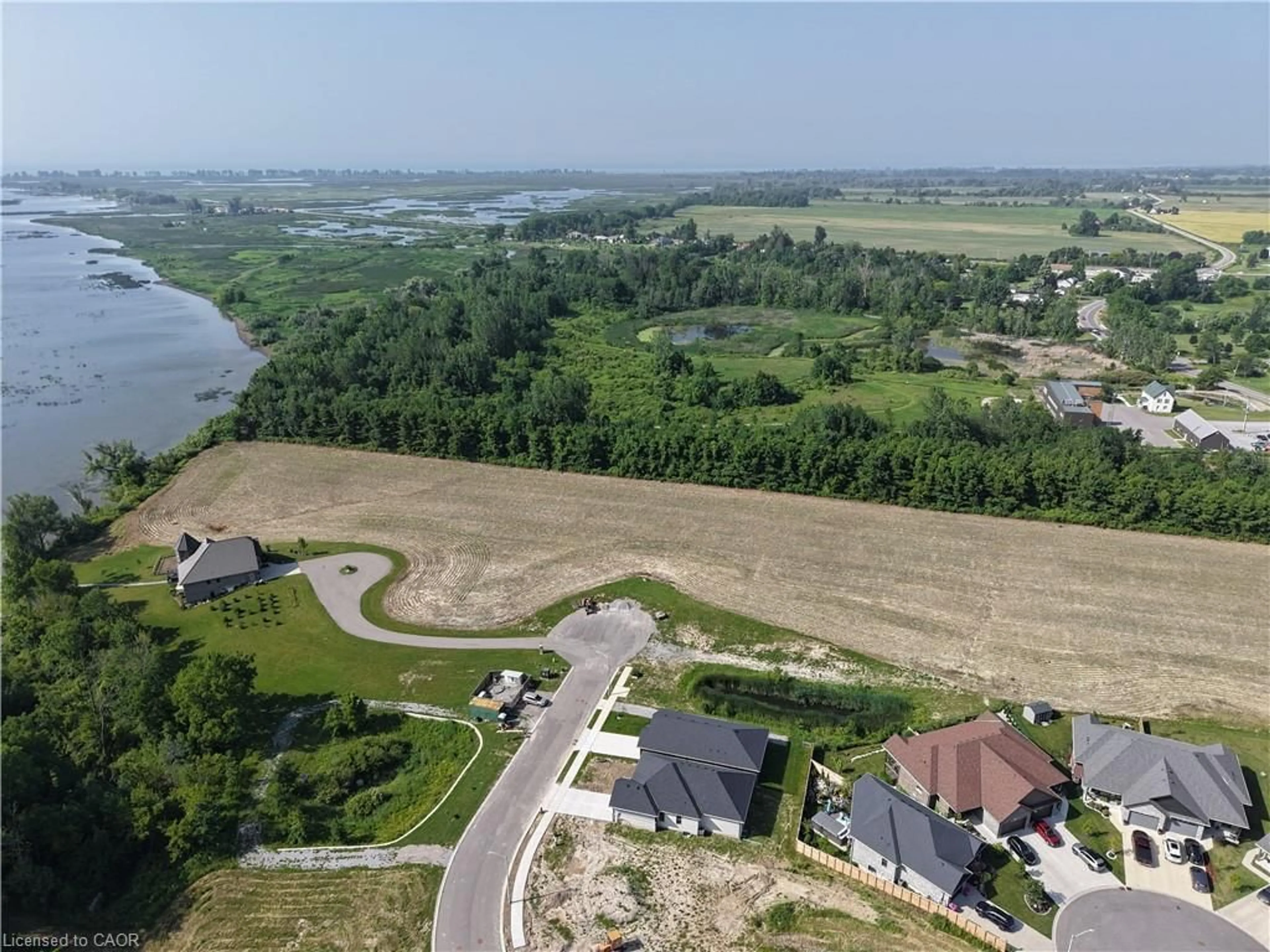 A pic from outside/outdoor area/front of a property/back of a property/a pic from drone, water/lake/river/ocean view for 50 Hunter Dr, Port Rowan Ontario N0E 1M0