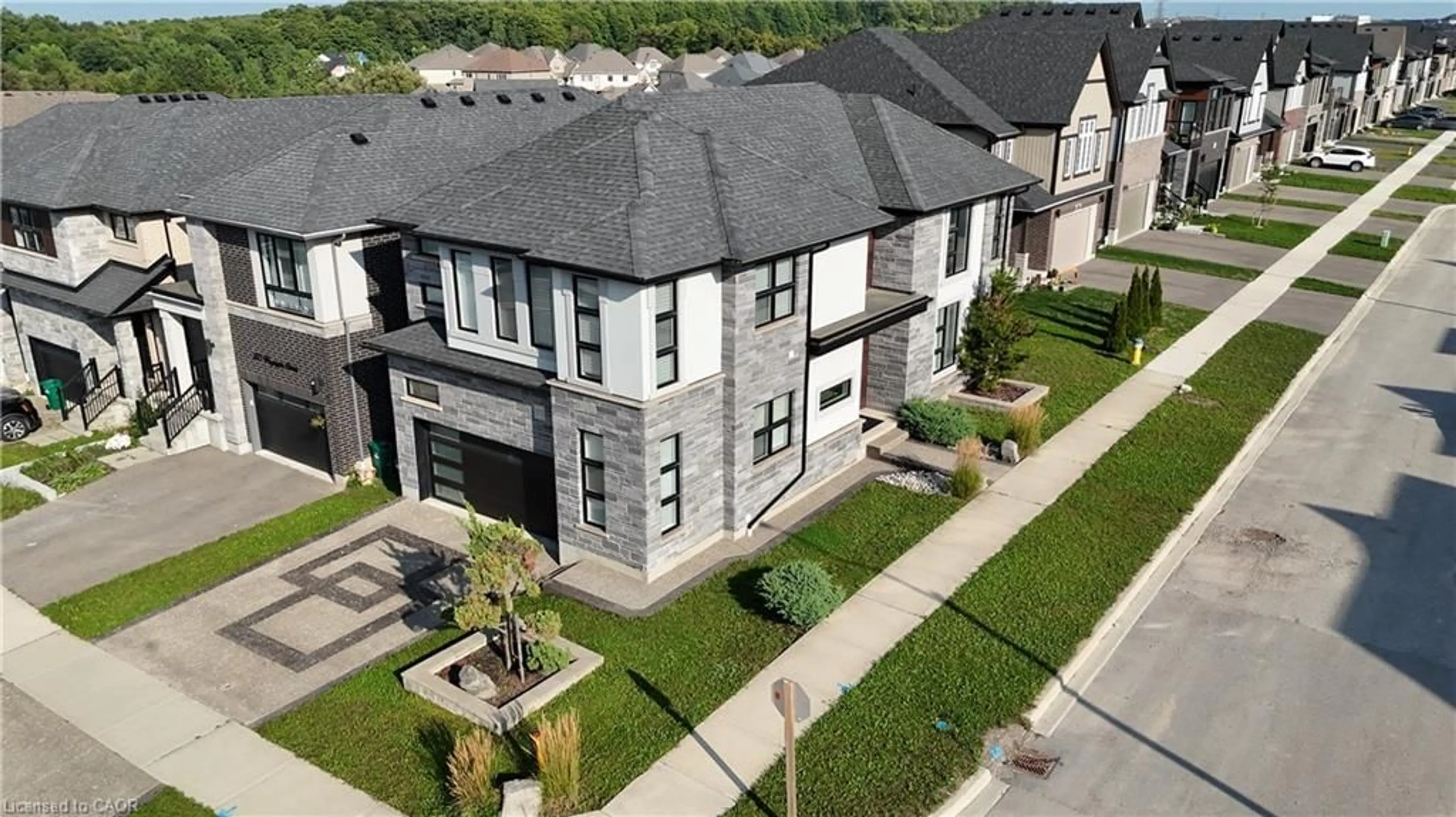 A pic from outside/outdoor area/front of a property/back of a property/a pic from drone, street for 573 Mayapple St, Waterloo Ontario N2V 0G2