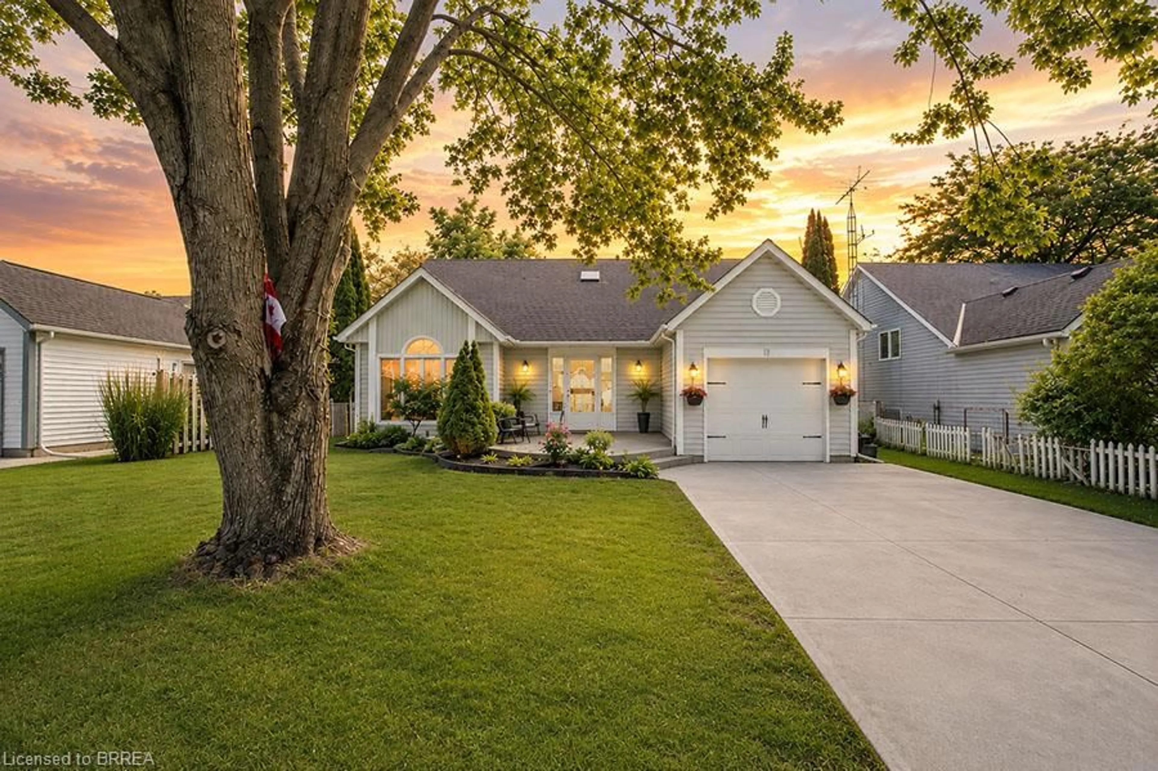 Home with vinyl exterior material, street for 61 Leslie Ave, Port Dover Ontario N0A 1N4